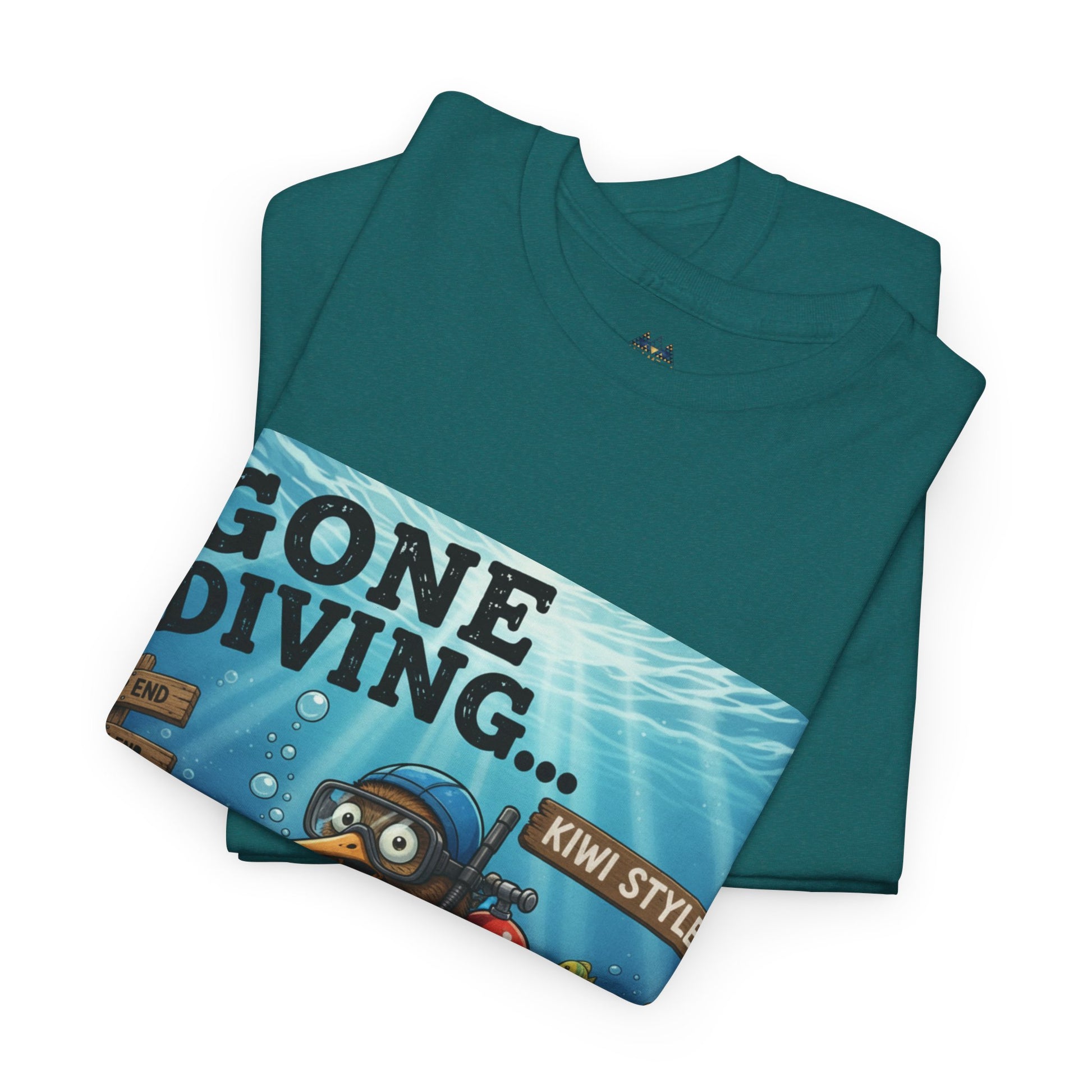 Teal T-shirt folded with diagonal “GONE DIVING…” graphic panel