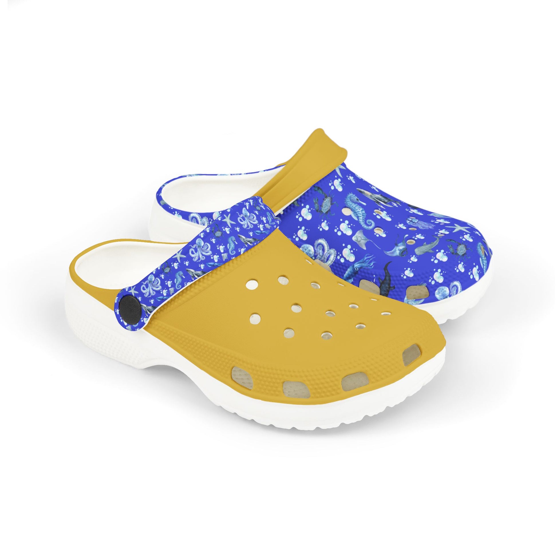 Kids' sea-themed clog shoes: blue print top with gold strap and white base, side view.