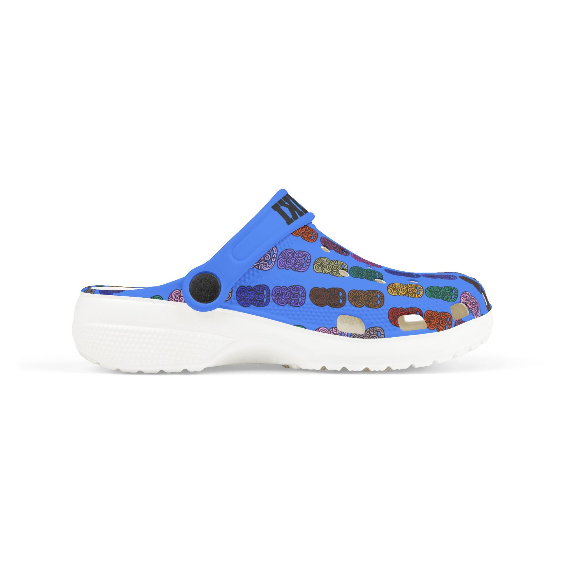 Kids slip-on casual shoe, angled side view, blue tiki-print upper with white sole