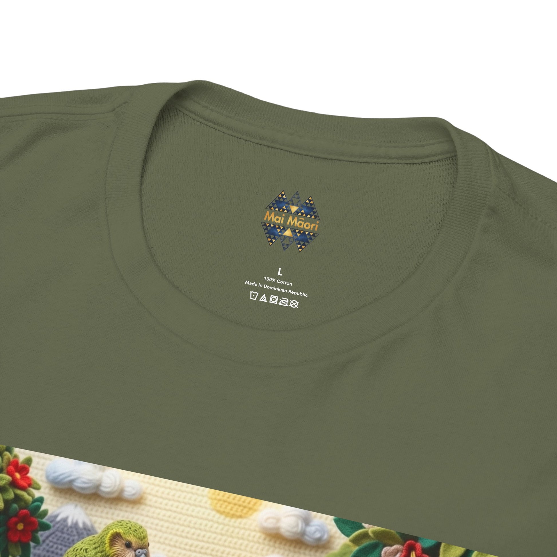 Olive green crewneck T-shirt with small chest emblem and bird-themed graphic hem panel