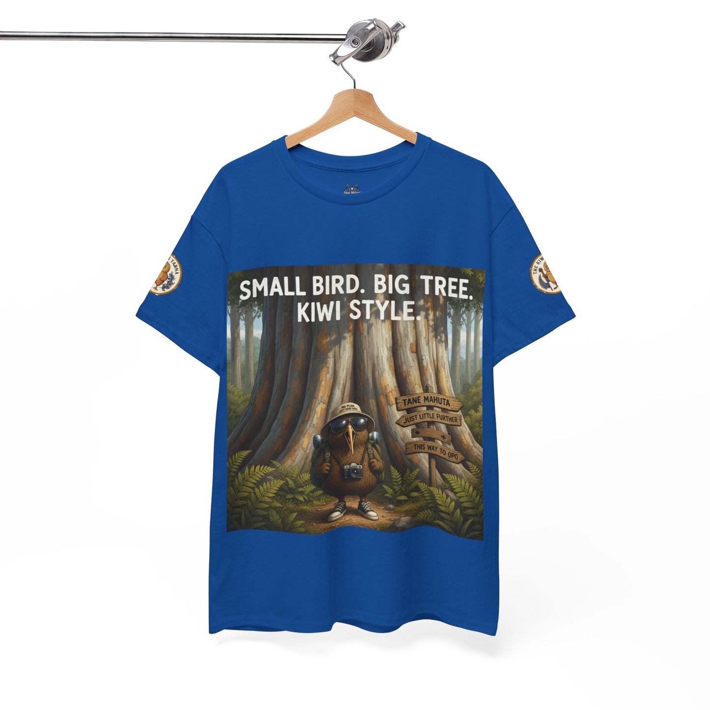 Blue crew-neck T-shirt on a hanger with front bird and tree graphic.