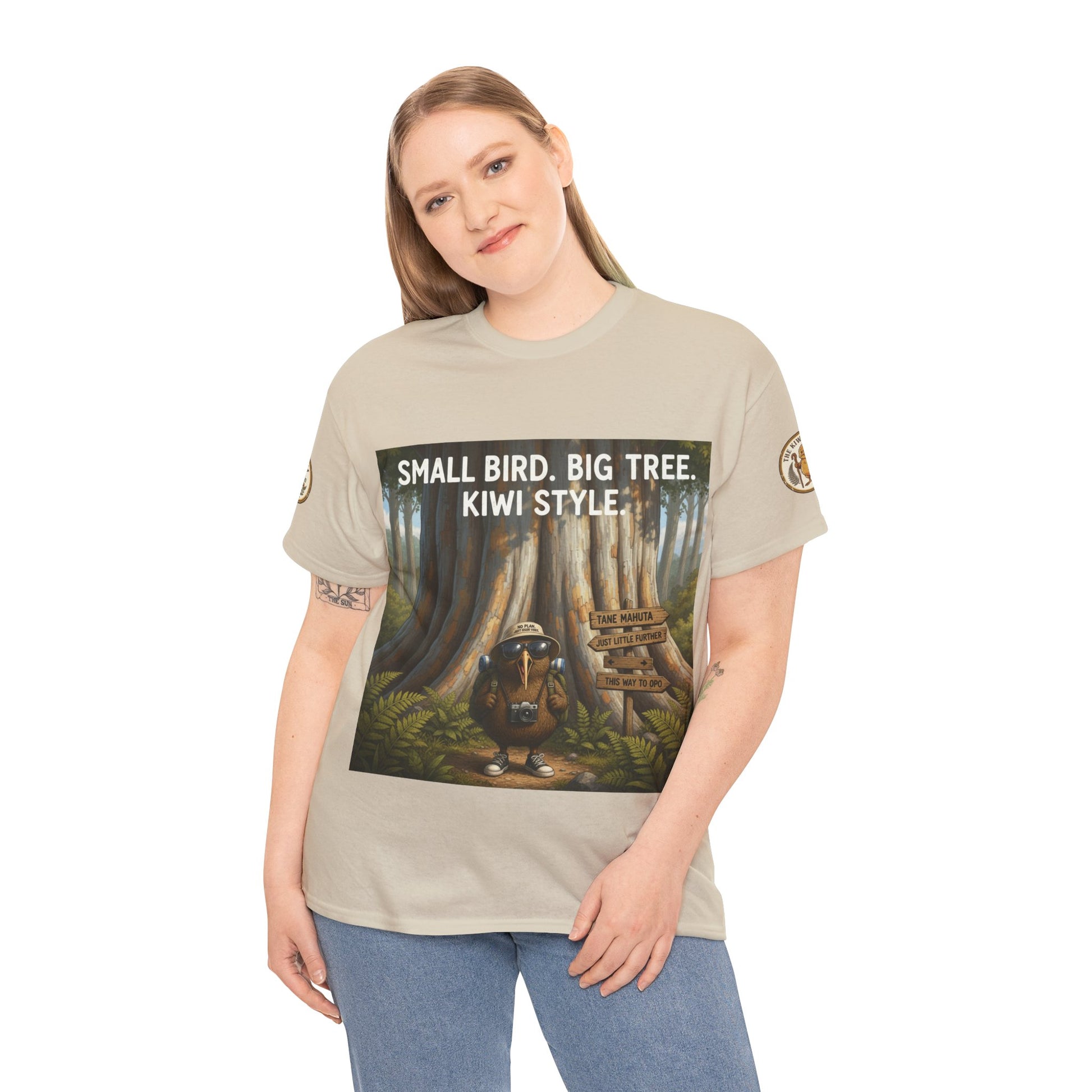Beige short-sleeve T-shirt worn by model with forest scene 'Kiwi Style' graphic
