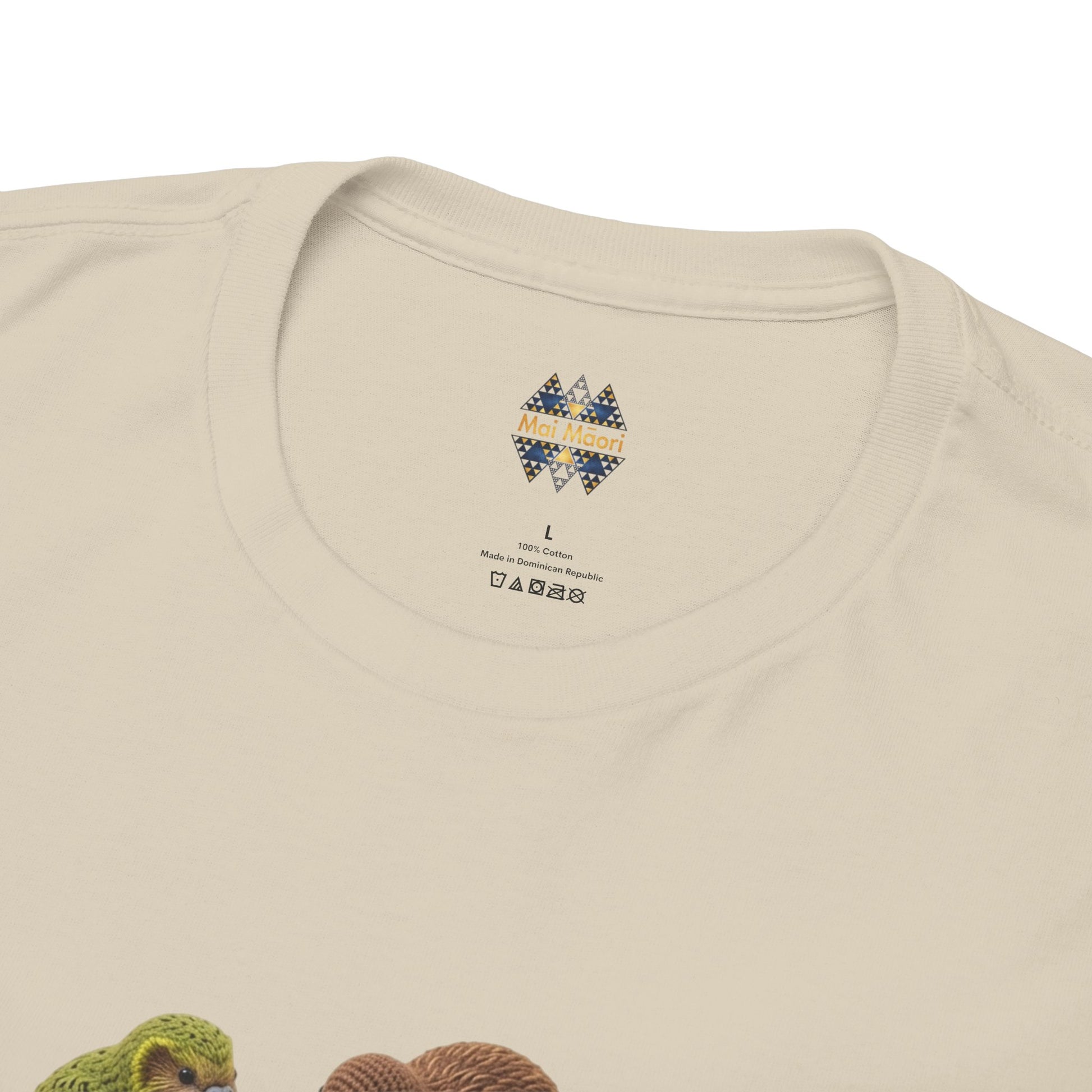Beige T-shirt neckline close-up with small logo patch at back collar