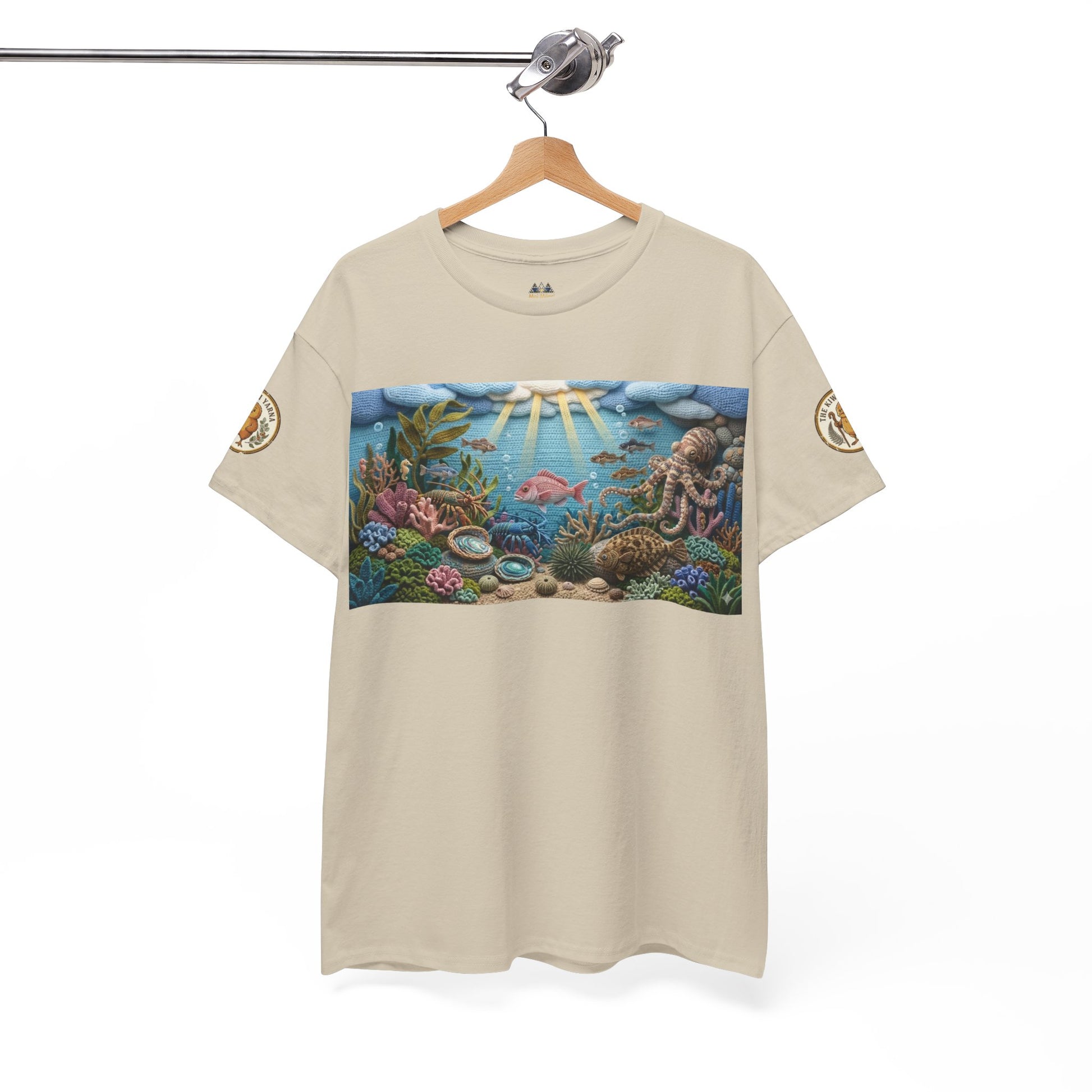 Under the sea graphic T-shirt on hanger, light beige crew neck with ocean scene panel