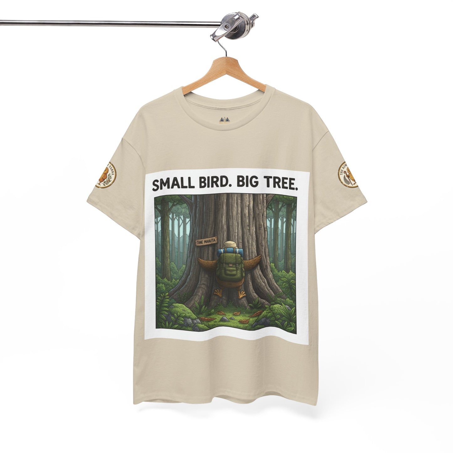 Beige T-shirt with square forest graphic and 'SMALL BIRD. BIG TREE.' header