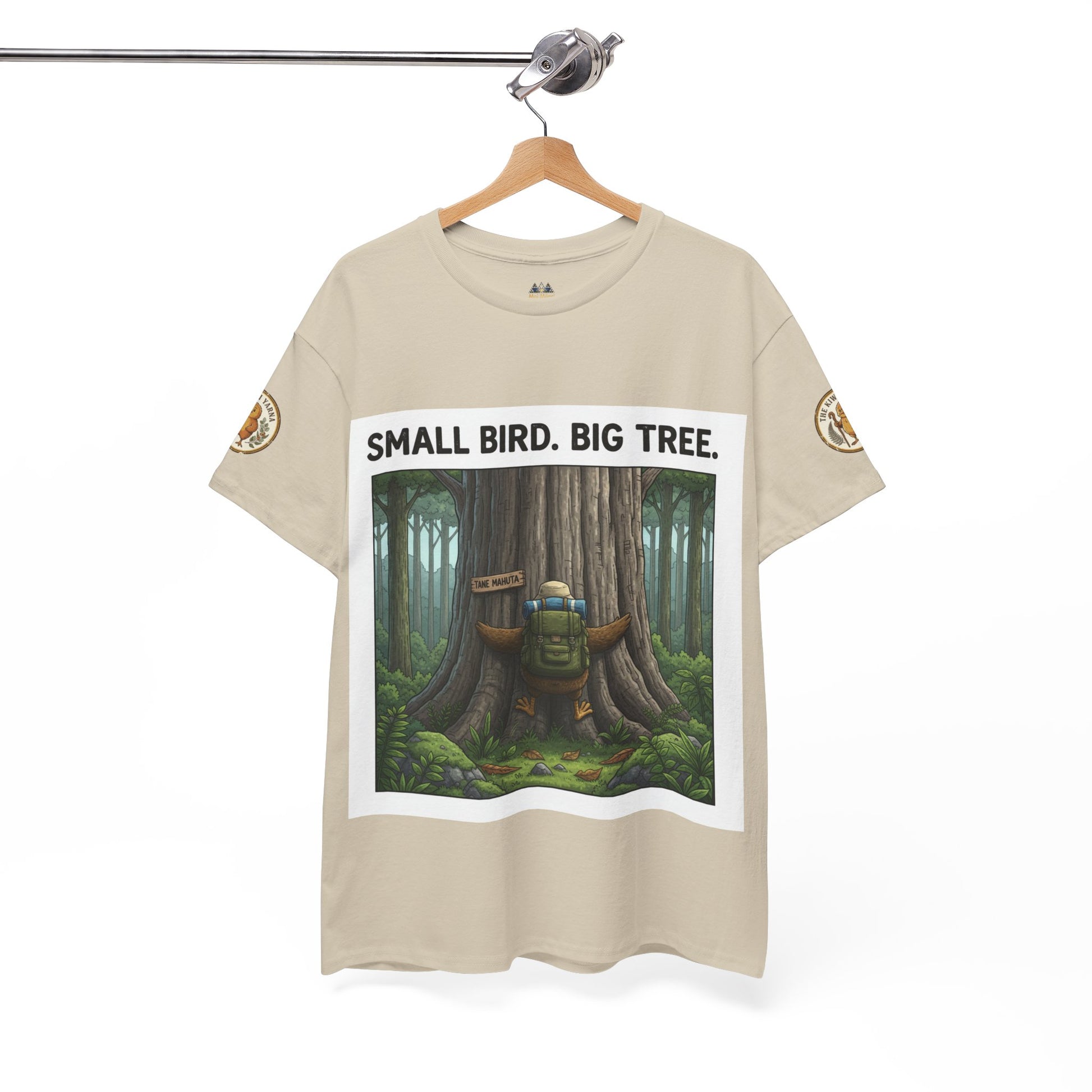 Beige T-shirt with square forest graphic and 'SMALL BIRD. BIG TREE.' header