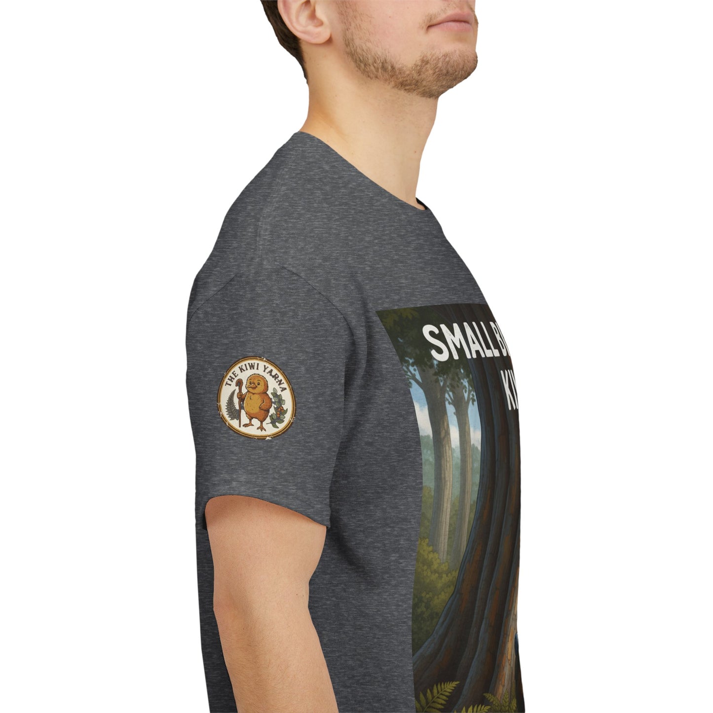 Dark gray kids T-shirt with circular sleeve badge and side forest graphic