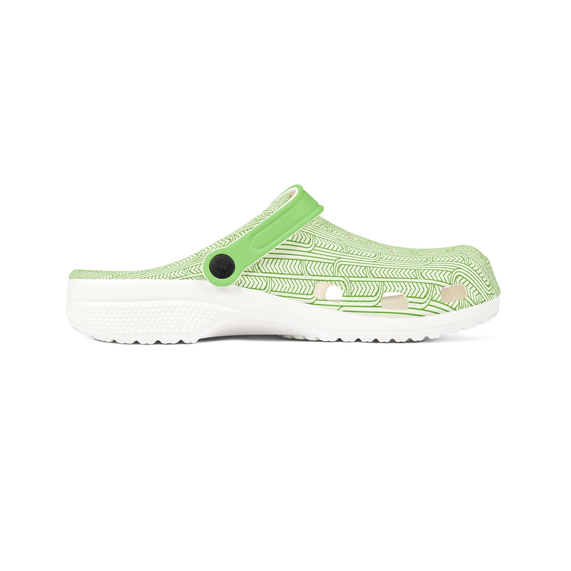 Maoritanga slide clogs, side view: green patterned upper, dark strap detail, white sole