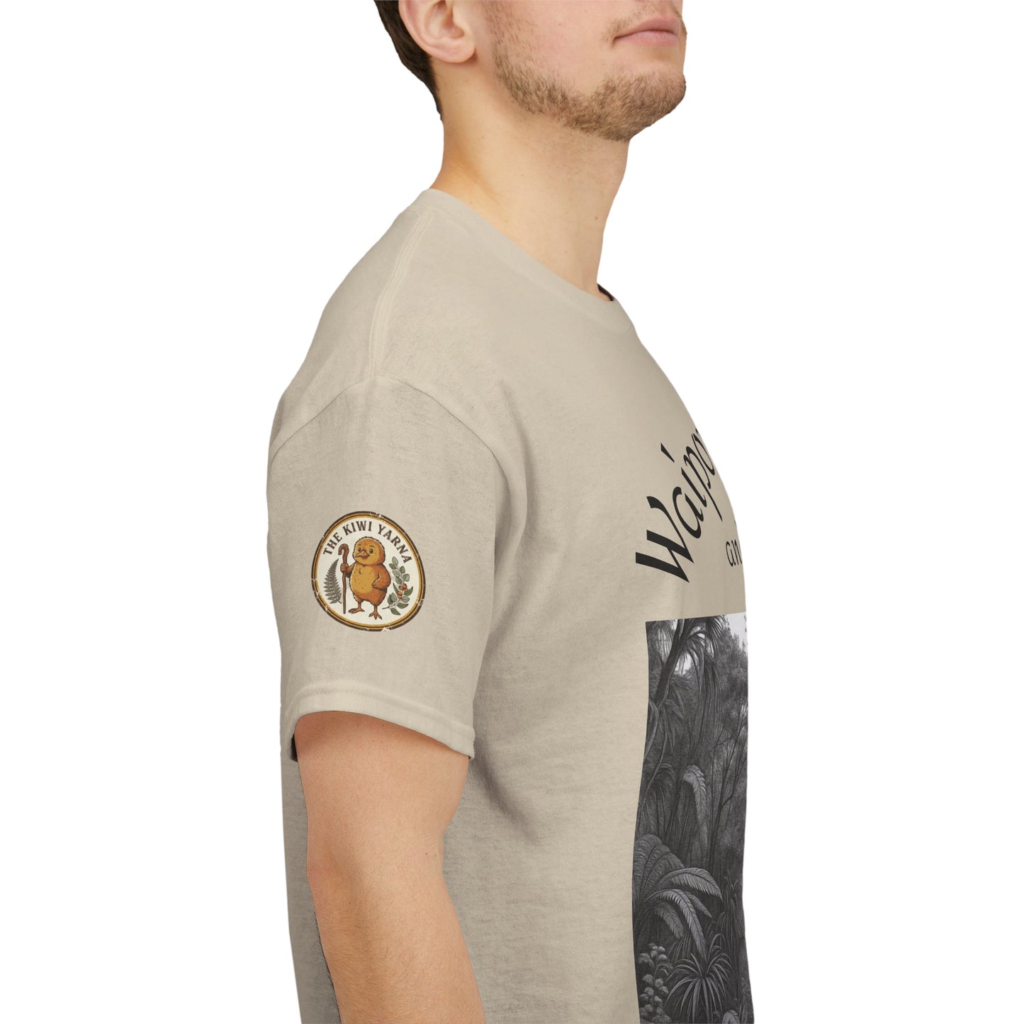 Beige T-shirt sleeve with round emblem patch and forest graphic panel