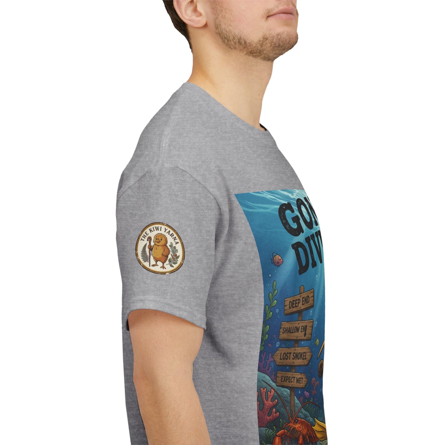 Gray crewneck T-shirt with circular sleeve patch and partial front underwater graphic