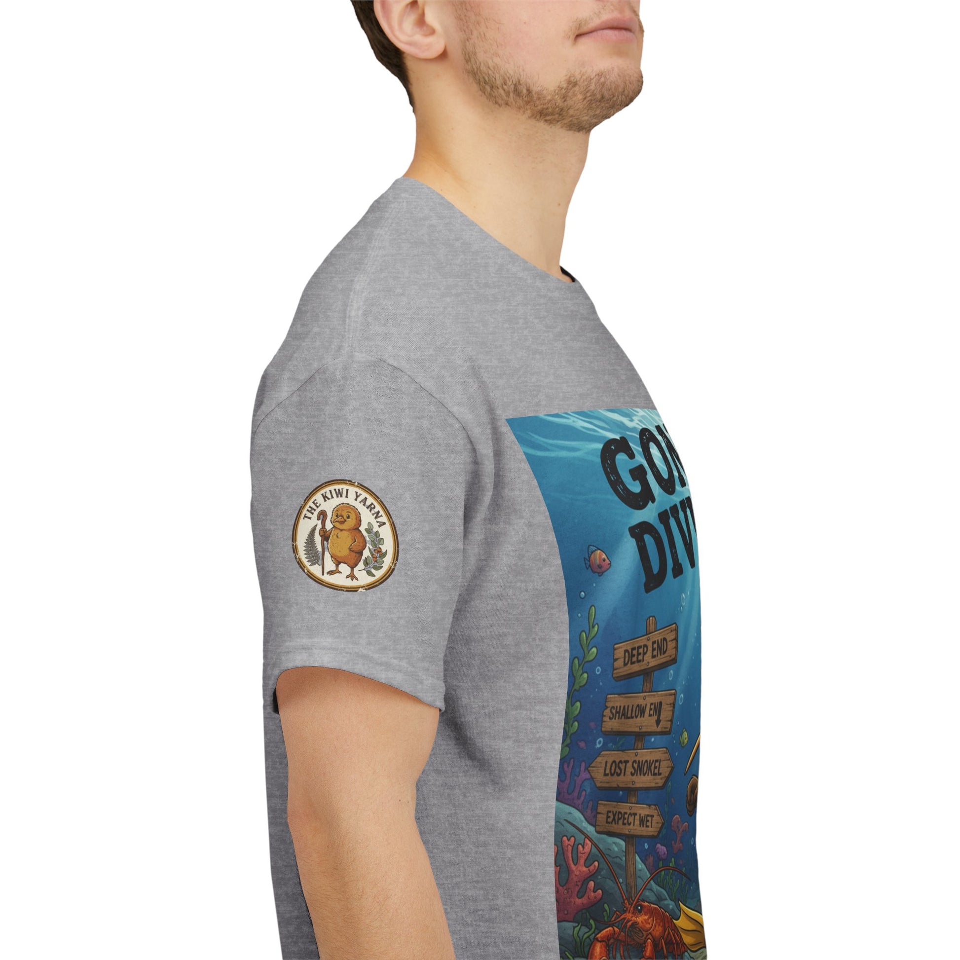 Gray crewneck T-shirt with circular sleeve patch and partial front underwater graphic