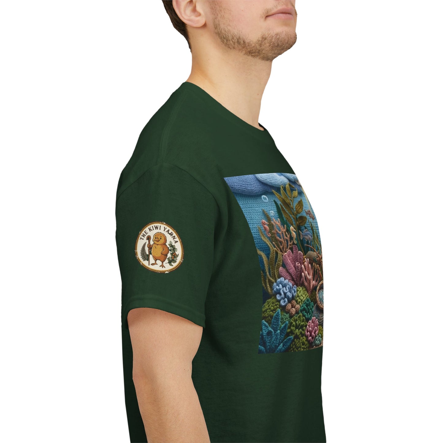 Man wearing dark green T-shirt with underwater graphic panel and circular sleeve logo