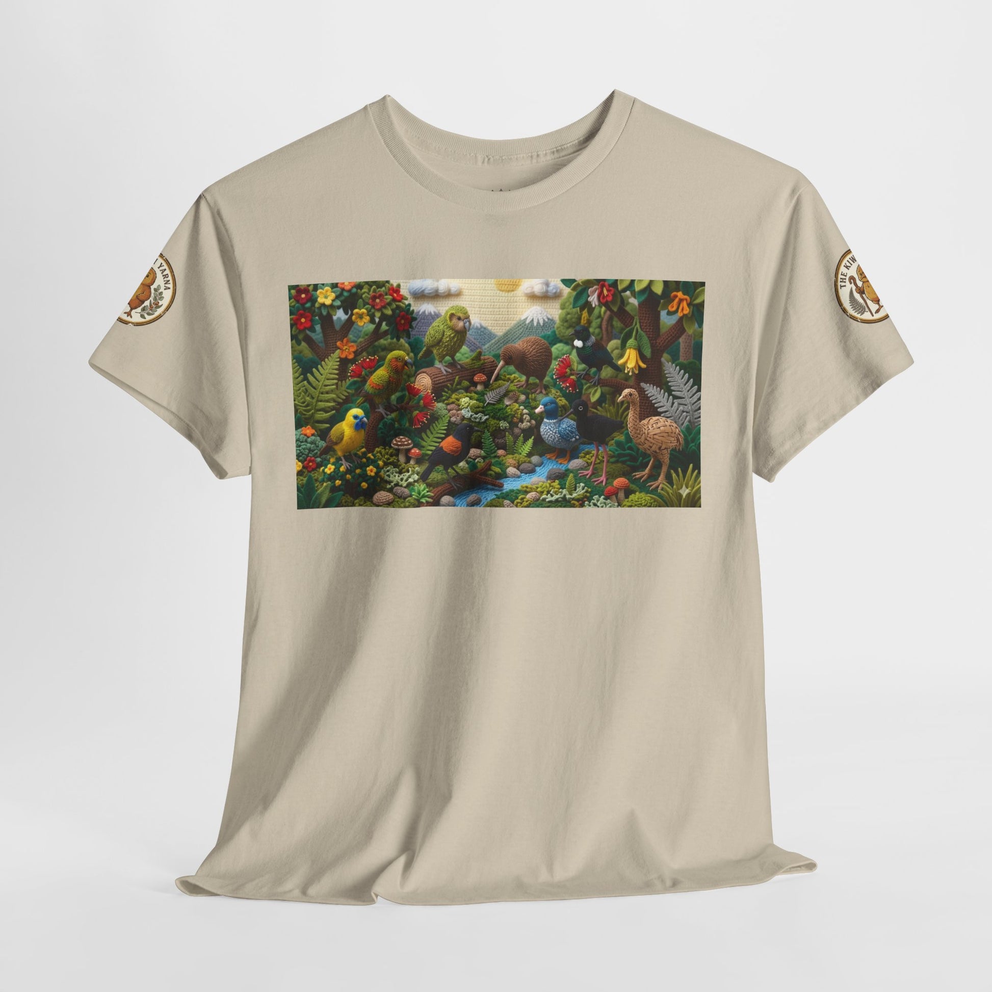 Sand crew-neck T-shirt front view with rectangular birds-and-forest graphic and sleeve patches.
