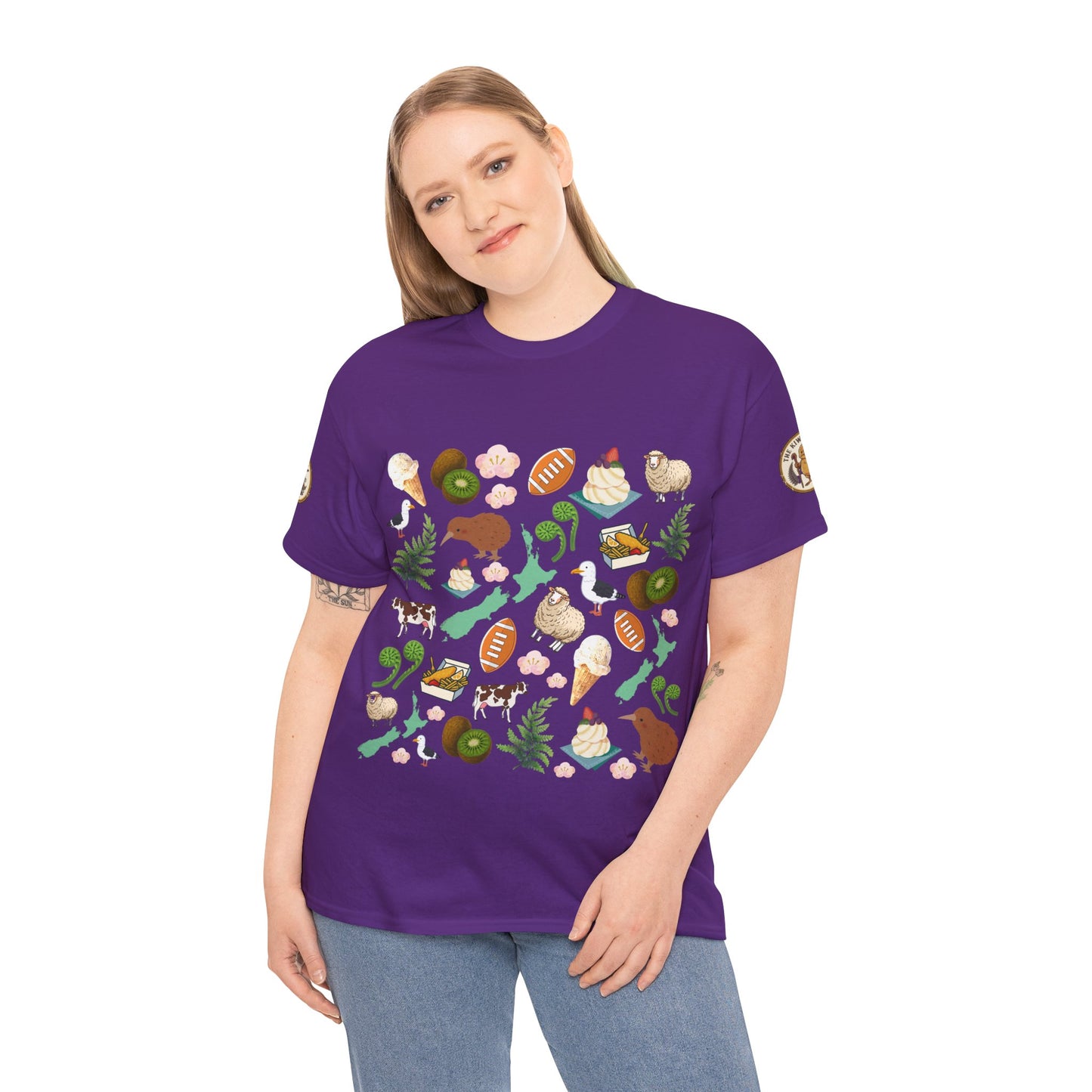 Kiwiana t-shirt in purple with colorful bird-and-fruit graphic, crew neck