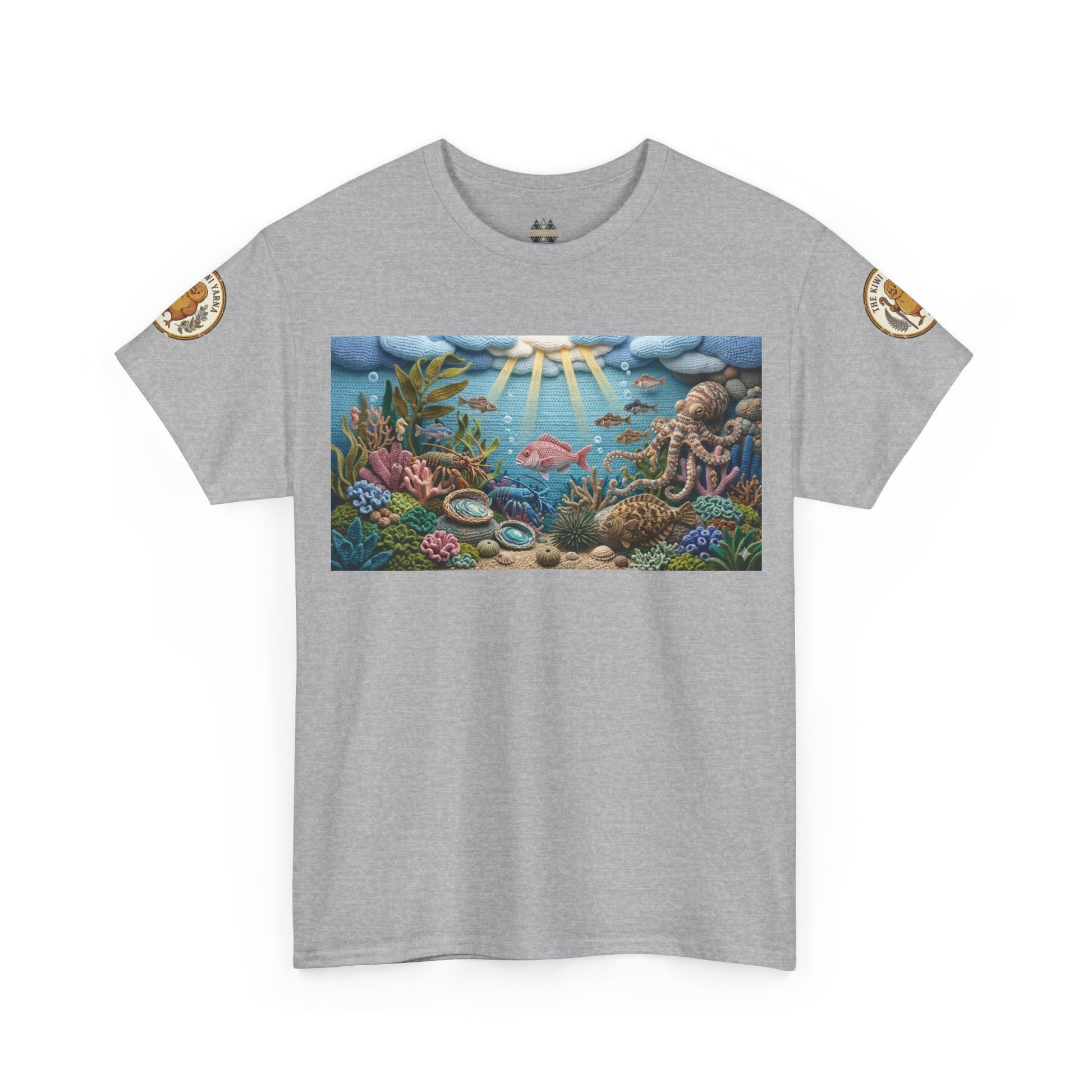 Gray T-shirt with centered underwater reef graphic panel; small circular arm patches on sleeves.