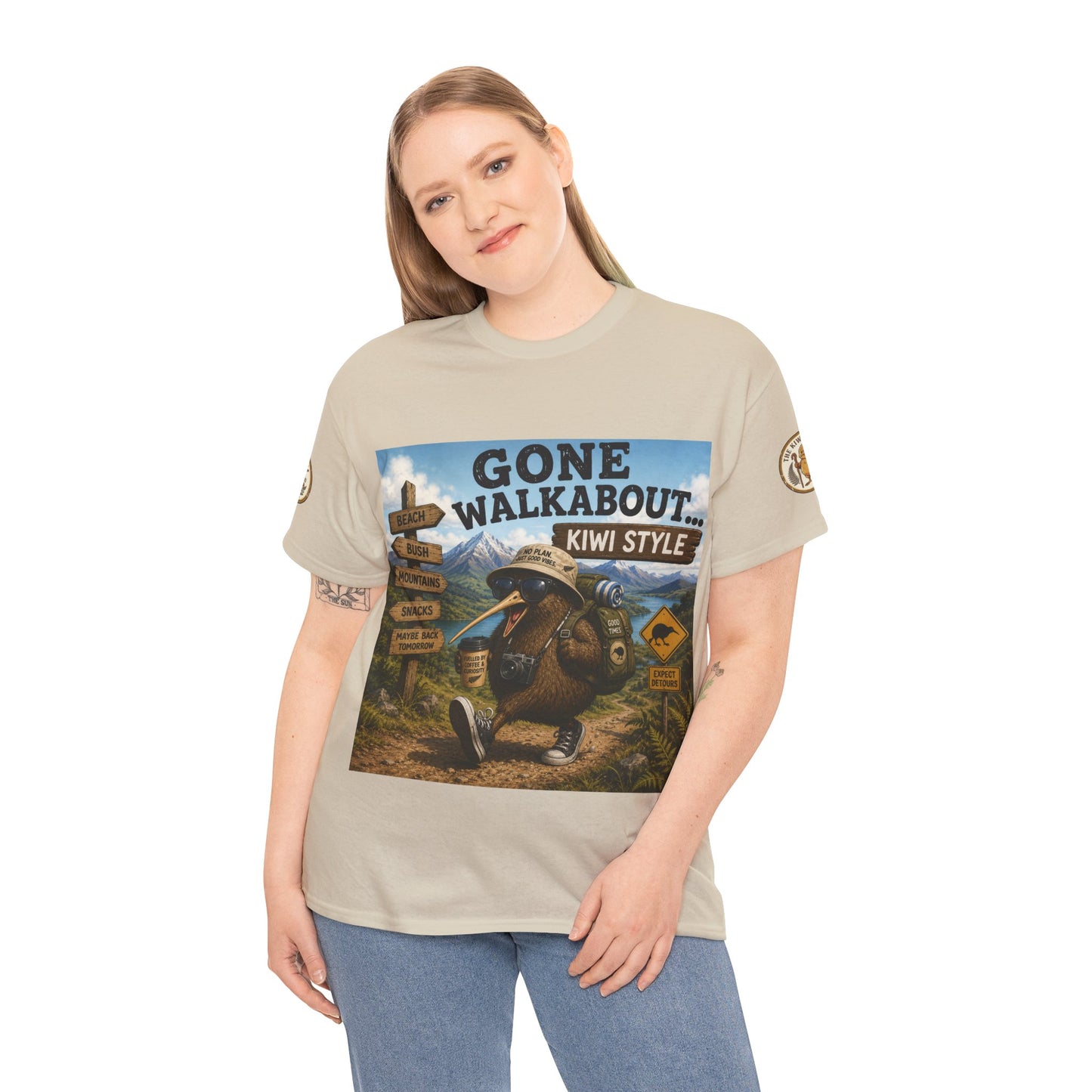 Natural T-shirt worn by model with “Gone Walkabout Kiwi Style” front graphic.