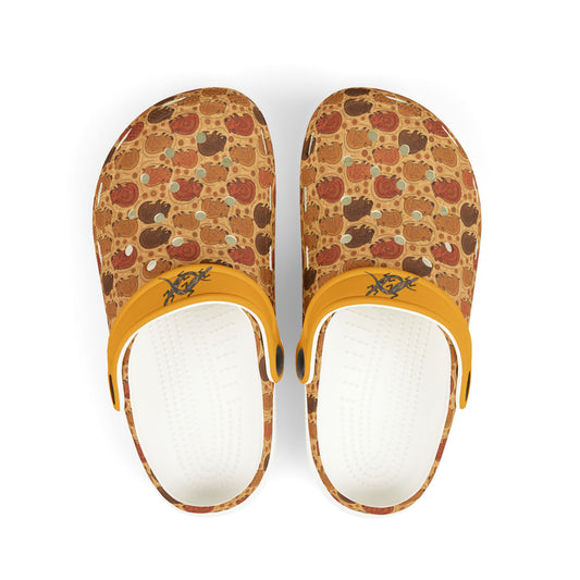 Patterned clog shoes with yellow strap and white insole, front view.