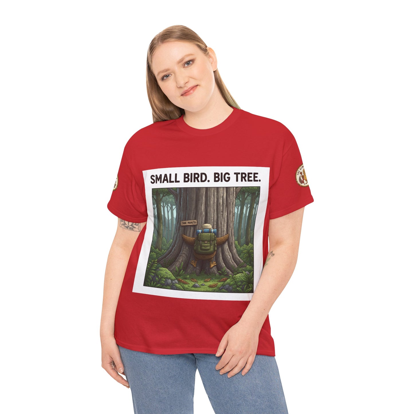 Red crewneck T-shirt with square forest graphic and 'Small Bird. Big Tree' text