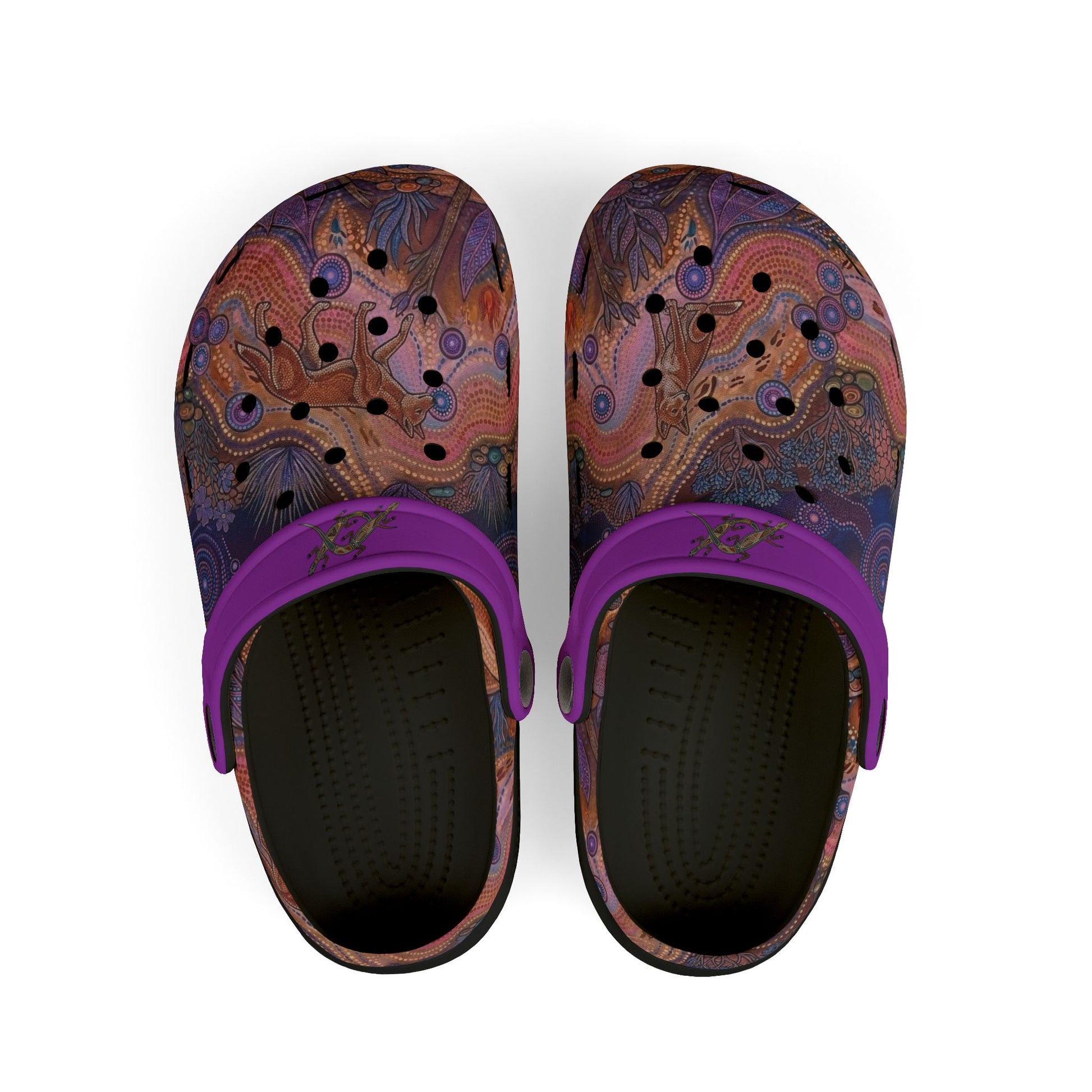 Pair of patterned clog shoes with purple straps and black interior