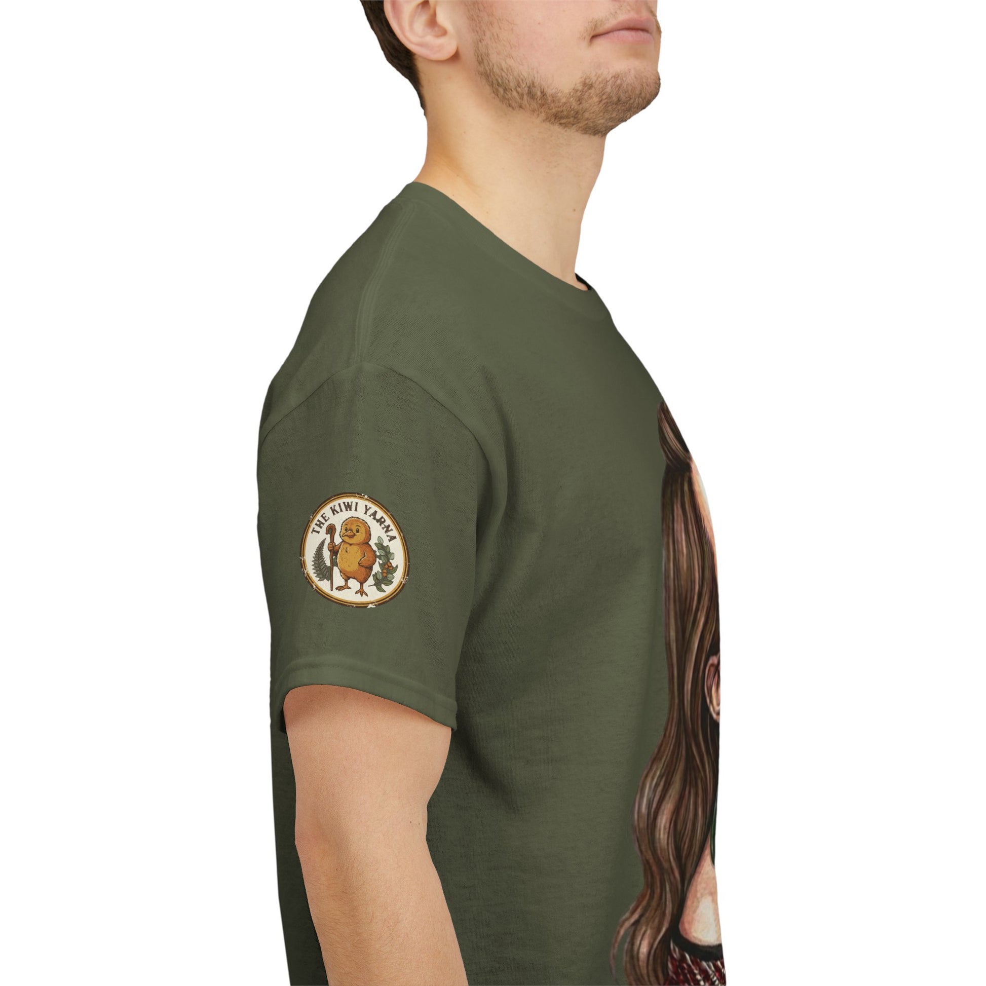 Olive green T-shirt with circular sleeve logo patch and side portrait graphic