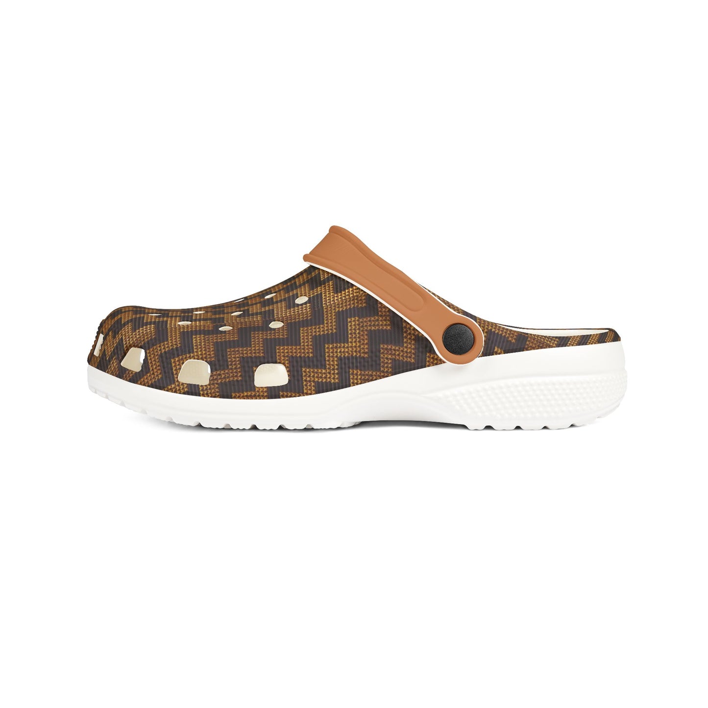 Slip-on clog with dark patterned upper, tan strap, and white vented foam sole