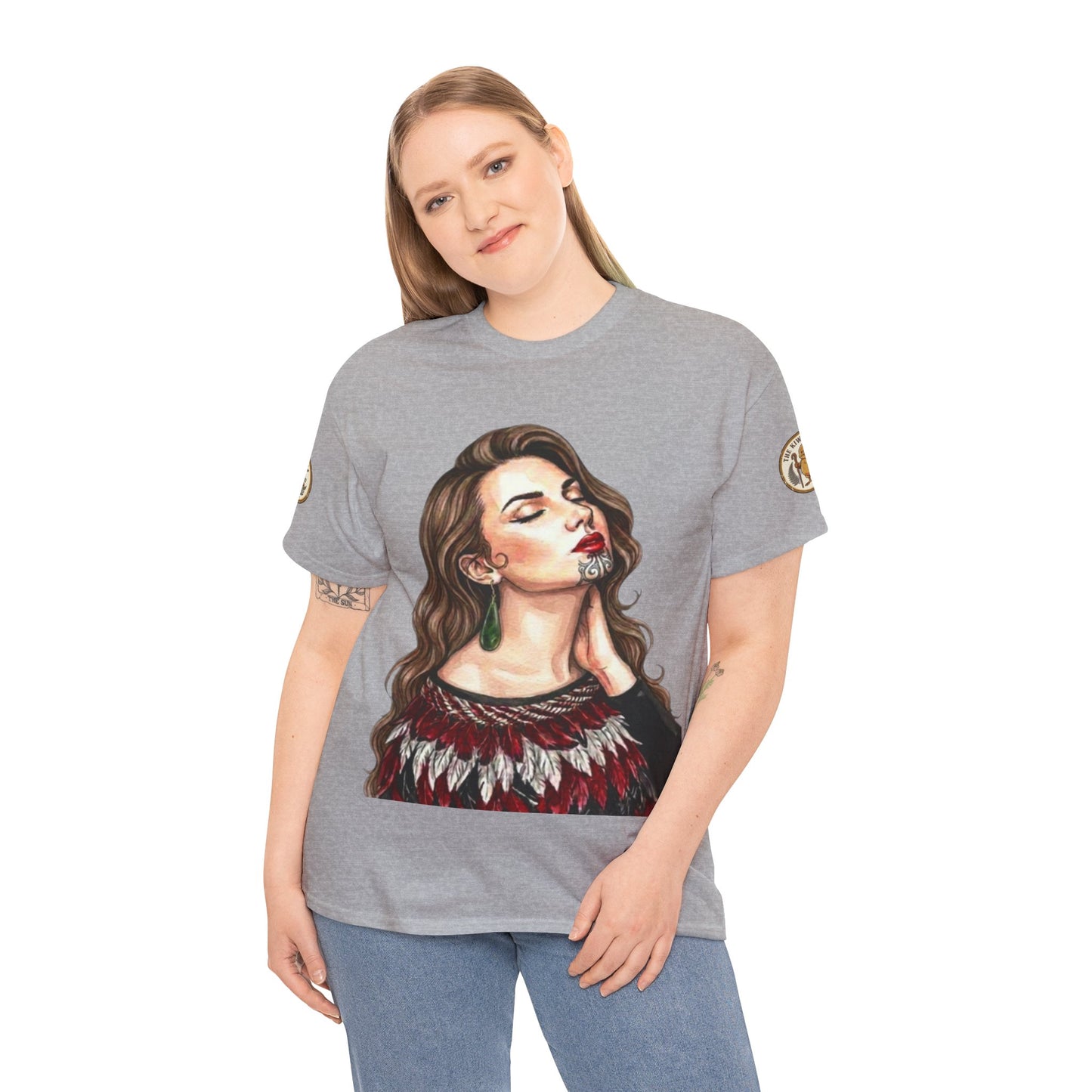 Gray crew-neck t-shirt with large portrait graphic and embroidered-style sleeve badge.