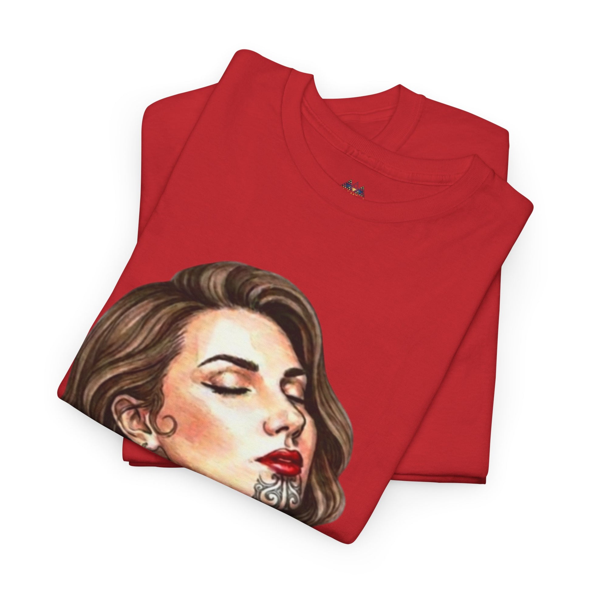 Korowai red crewneck graphic t-shirt with face artwork, folded front view