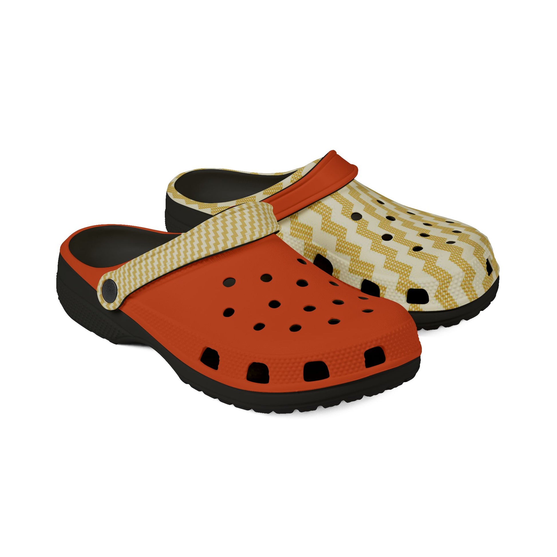 Poutama clogs with orange perforated front, zigzag upper, and black heel section