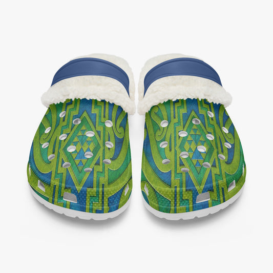Green patterned slide clogs with blue strap and white fuzzy lining, pair view from above