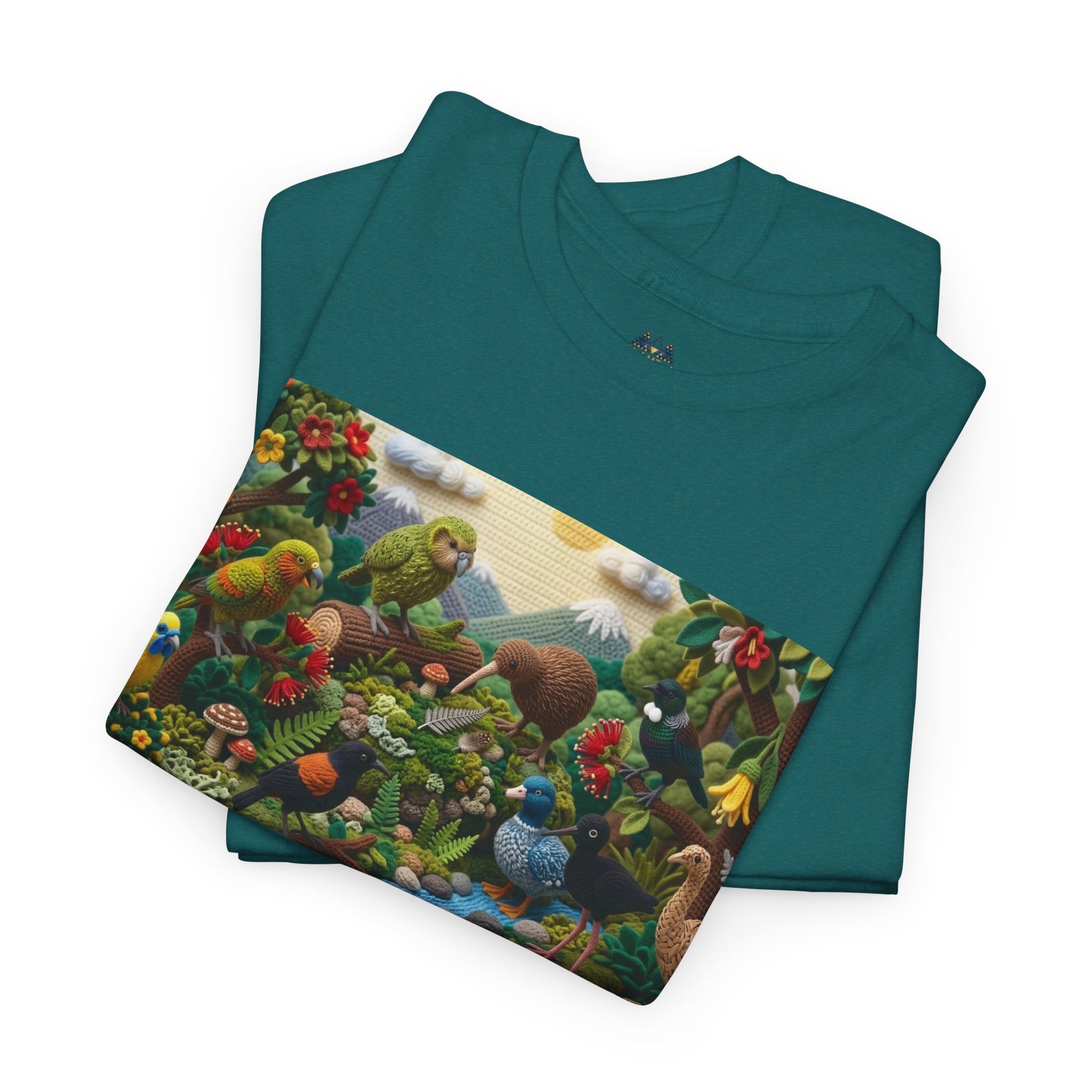 Teal T-shirt with large rectangular bird and foliage graphic print across chest.