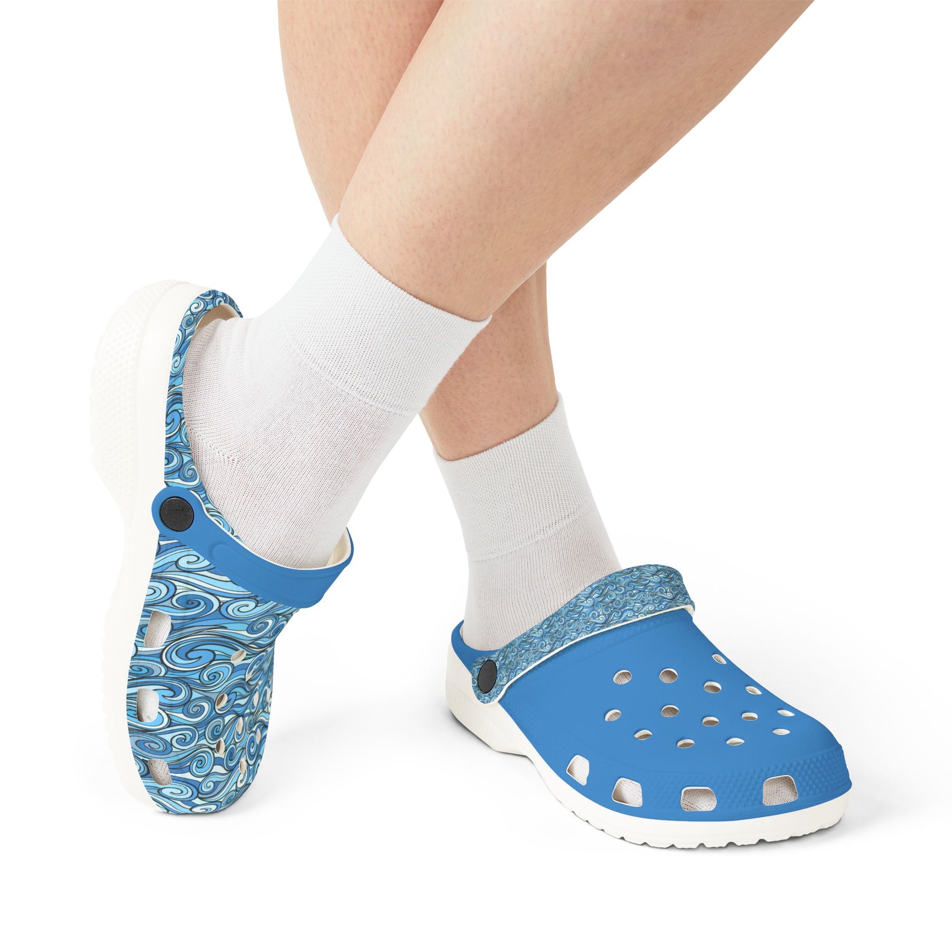 Blue slip-on clog on foot with white sock and patterned upper detail