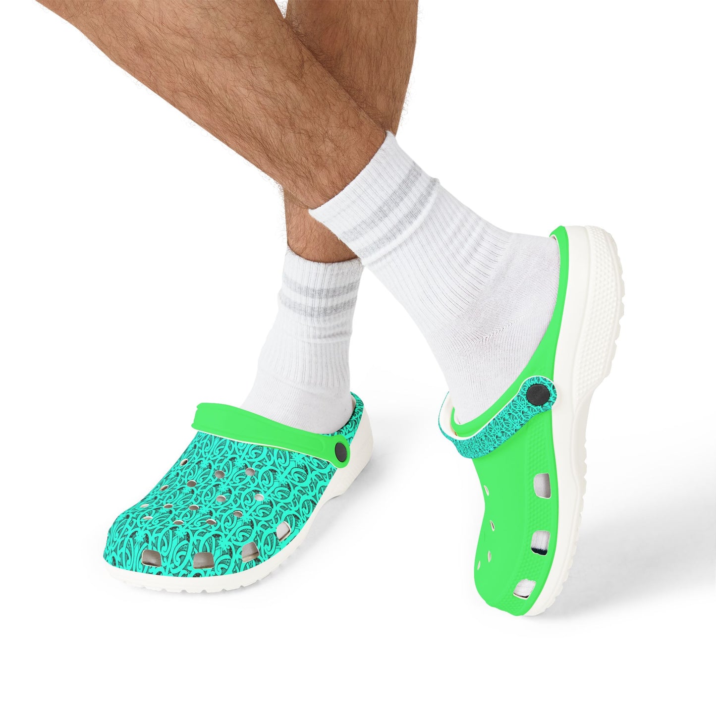 Neon green and teal clog sandals worn with white socks on feet