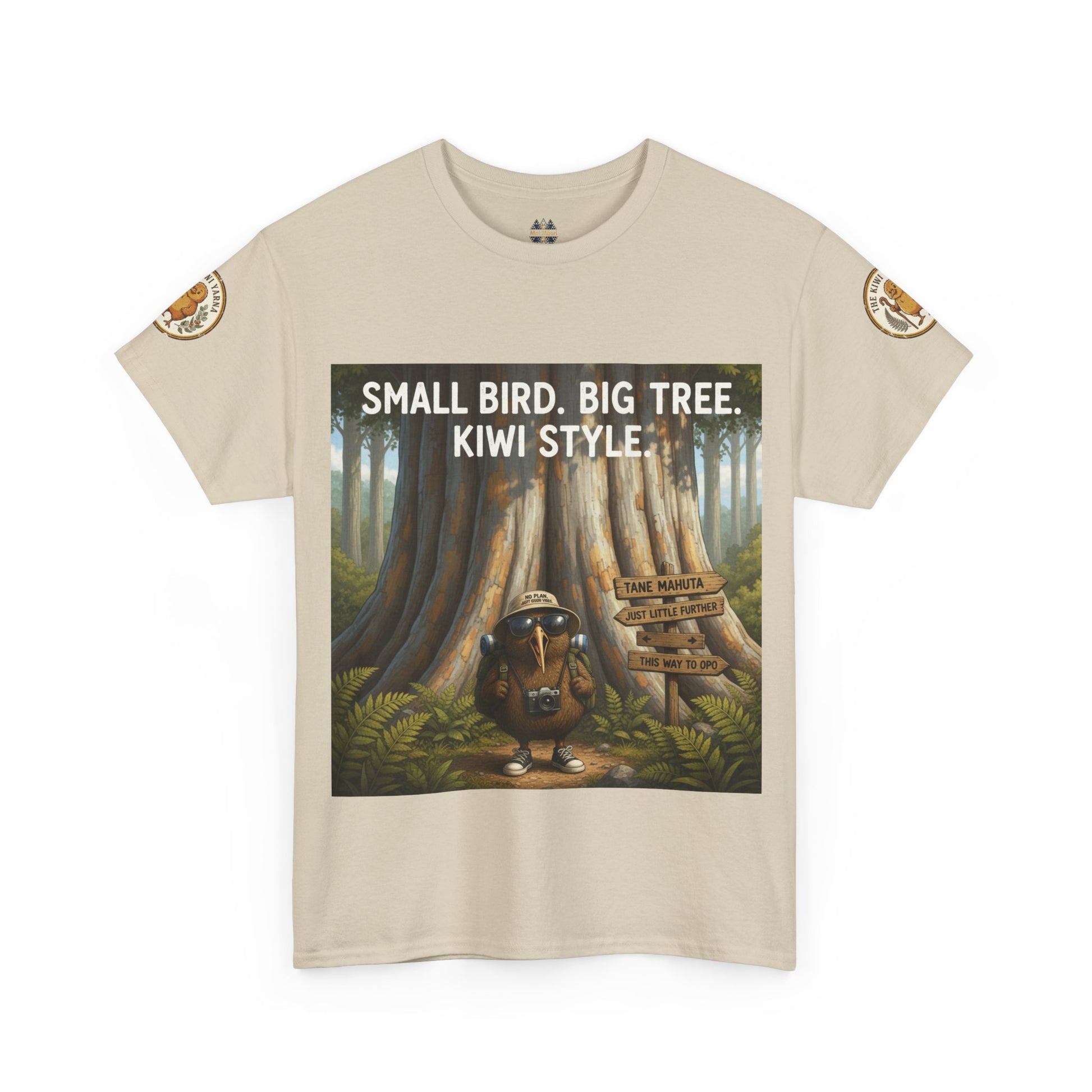 Beige crewneck T-shirt with front graphic of kiwi in forest and logo sleeve patches