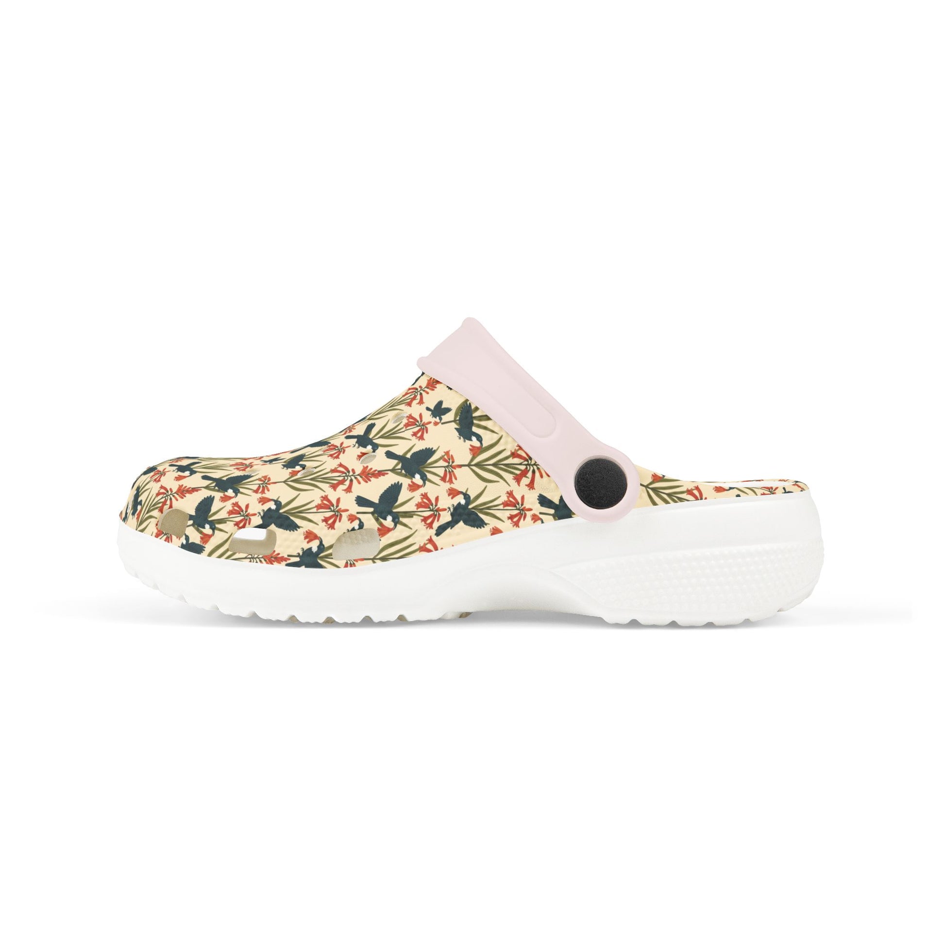 Kids slip-on clog shoes with floral print, perforated vents, light collar, white outsole.