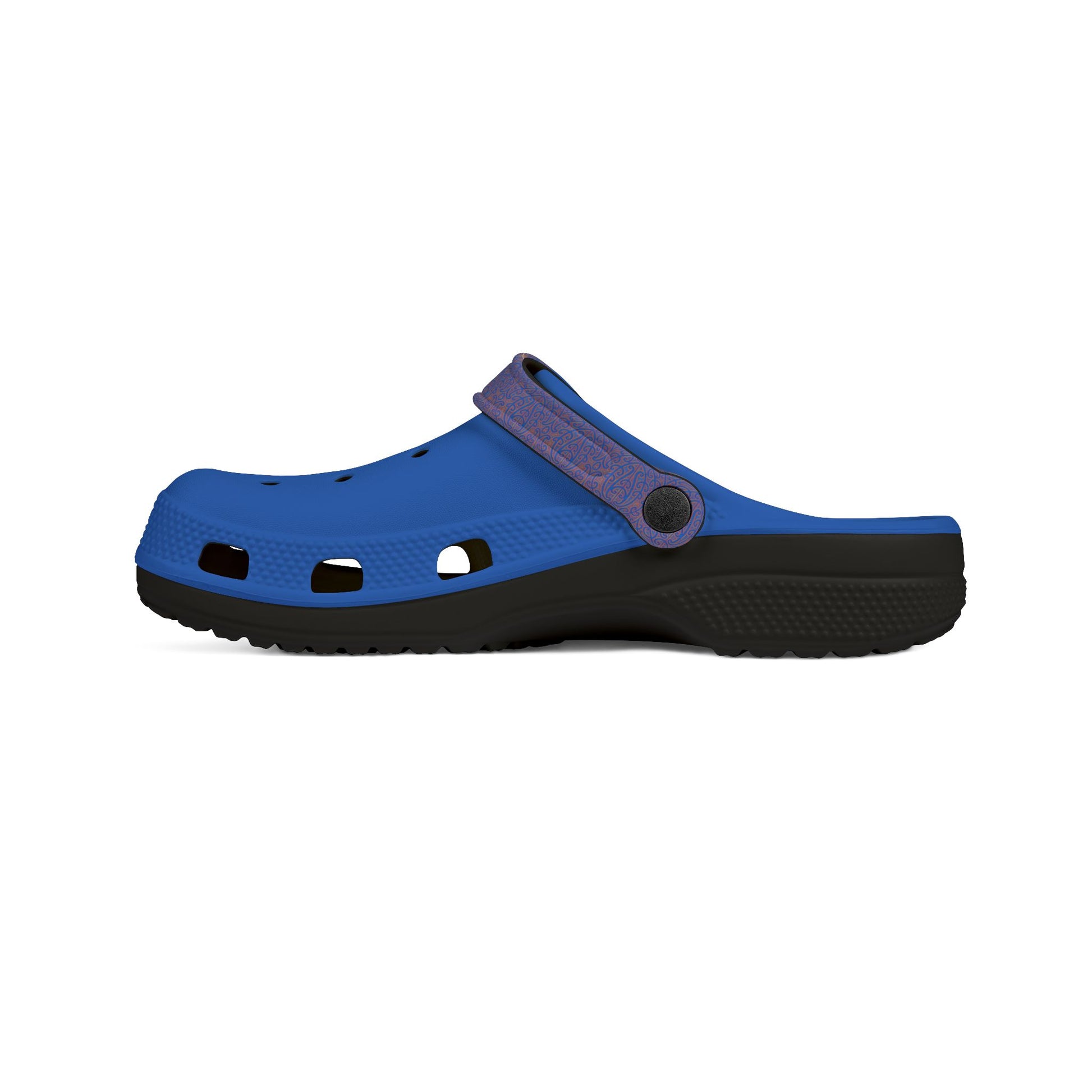 Blue croc-style clog with purple pattern strap, vent holes, and dark rubber outsole.