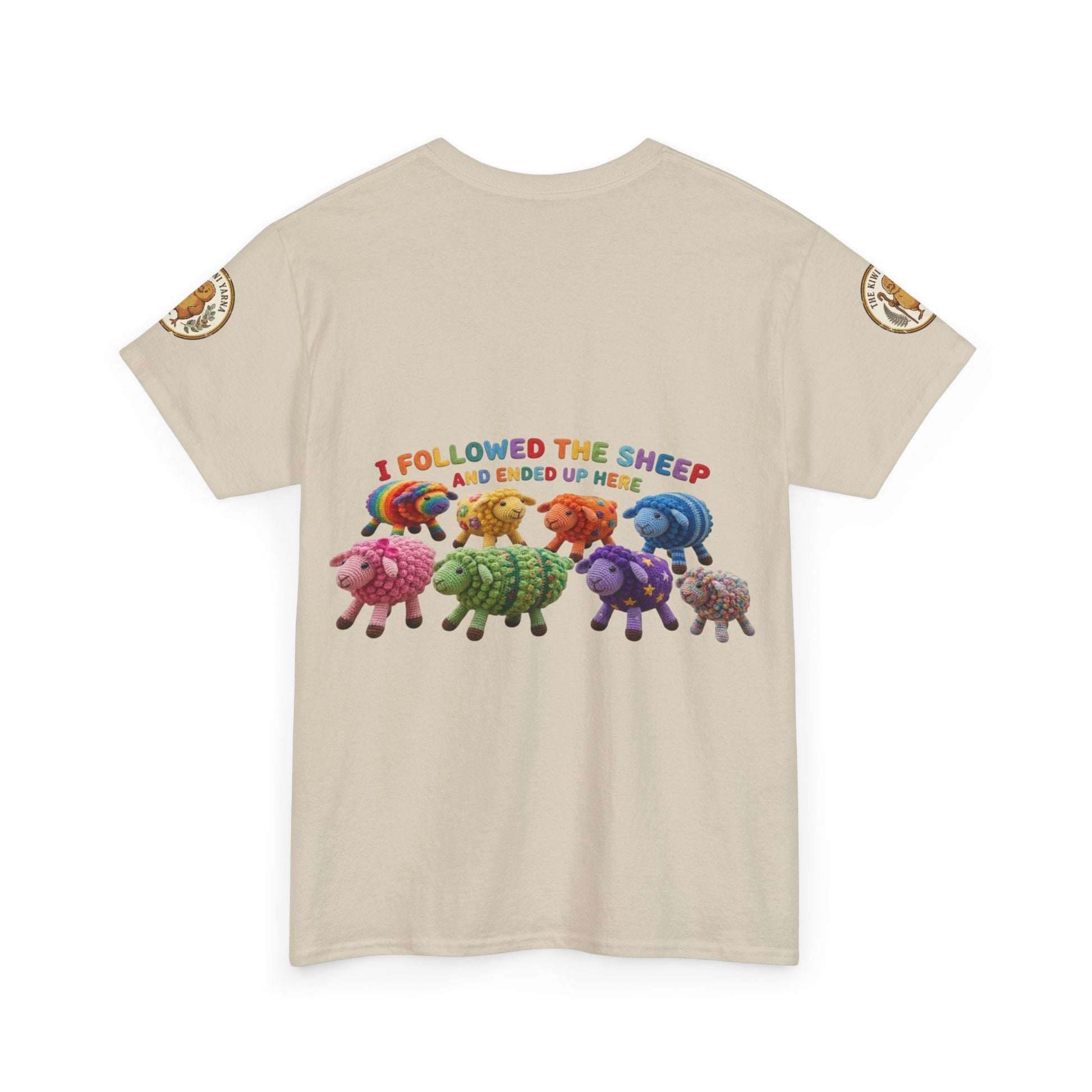 Light tan short-sleeve T-shirt with colorful sheep graphic and small sleeve patch accents