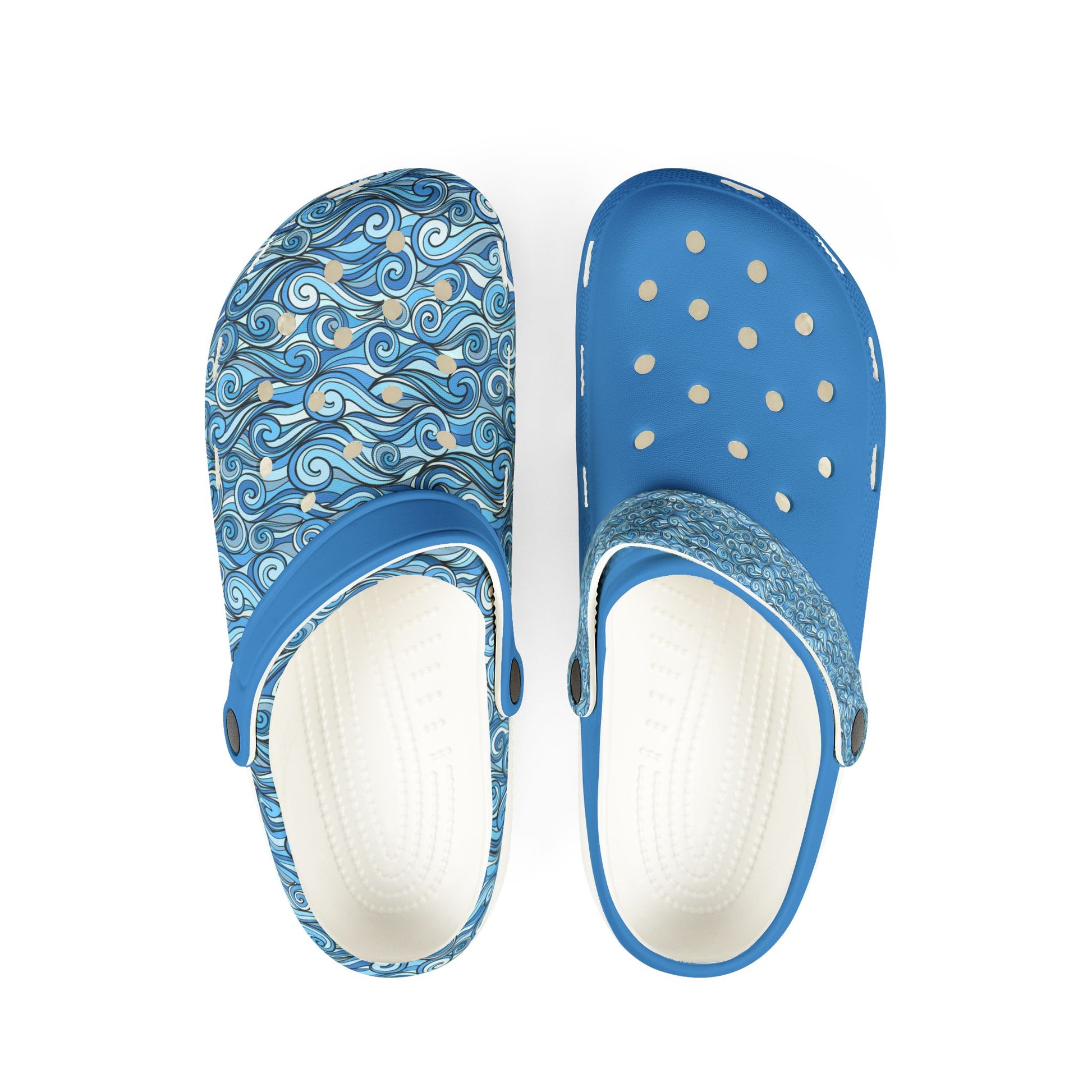 Blue patterned slip-on clogs with perforated toe holes and cushioned white footbed