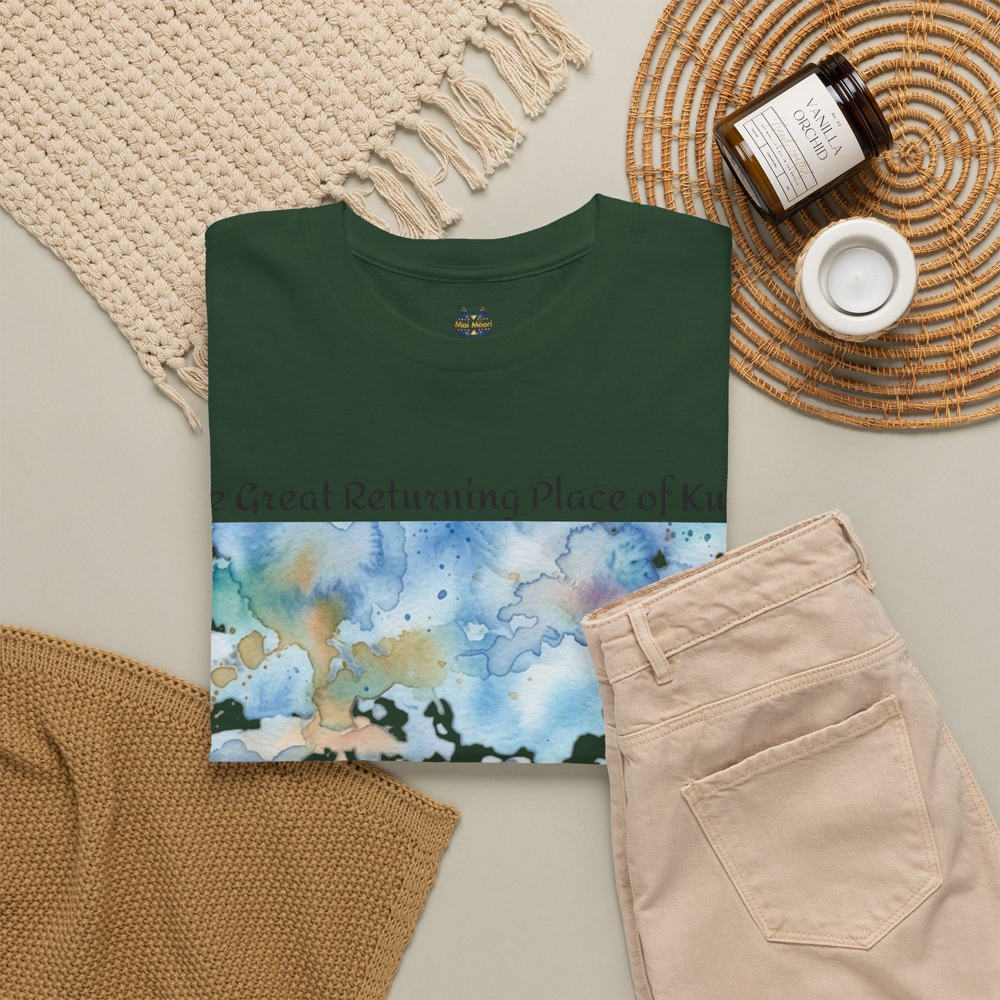Olive green graphic T-shirt with blue landscape print and crew neckline