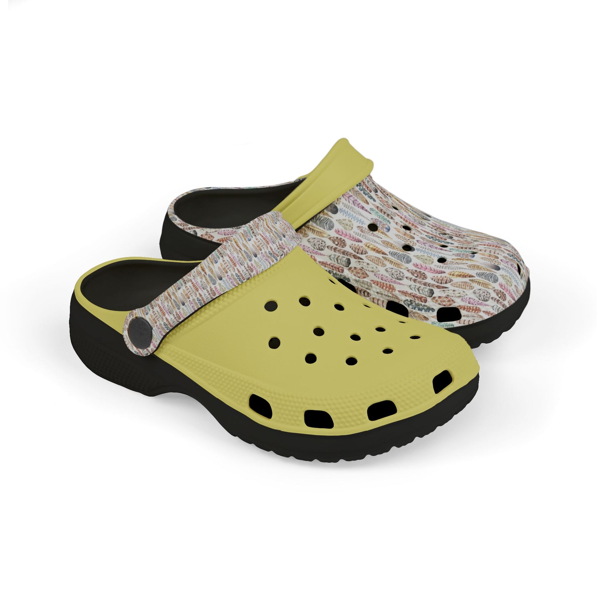Croc-style clogs with white patterned upper, yellow strap, and black lining
