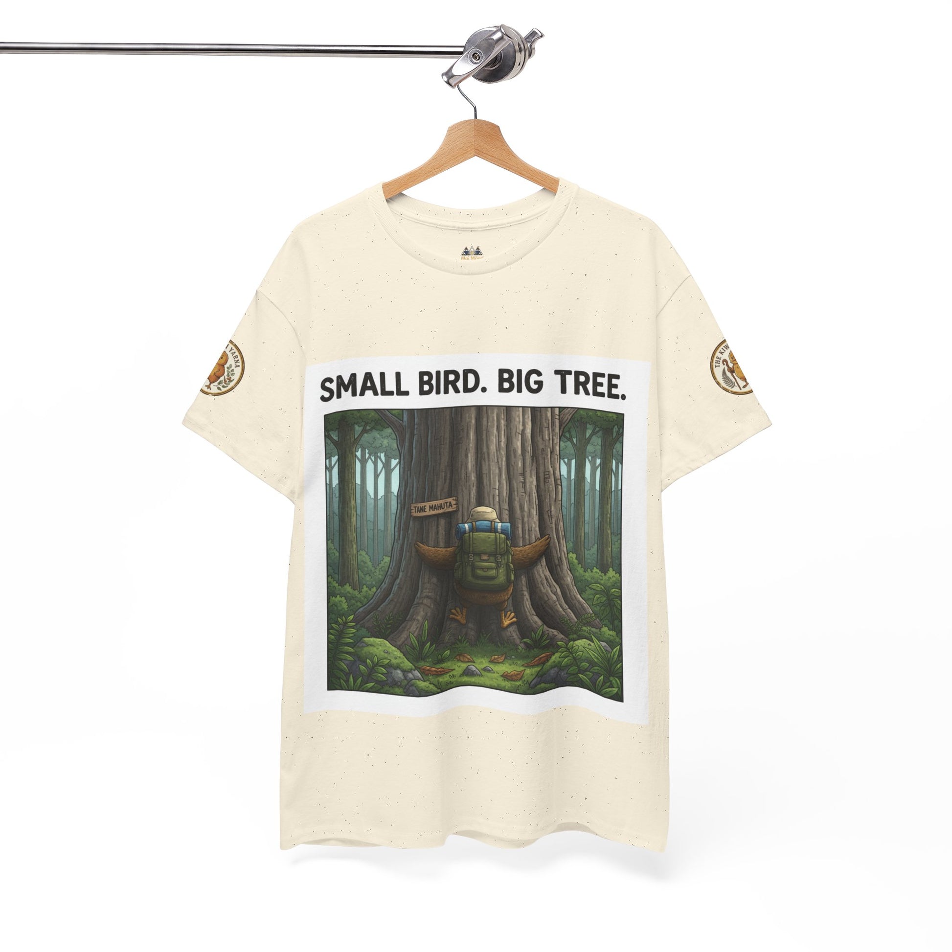 Ivory graphic crewneck T-shirt on hanger with centered forest illustration box print