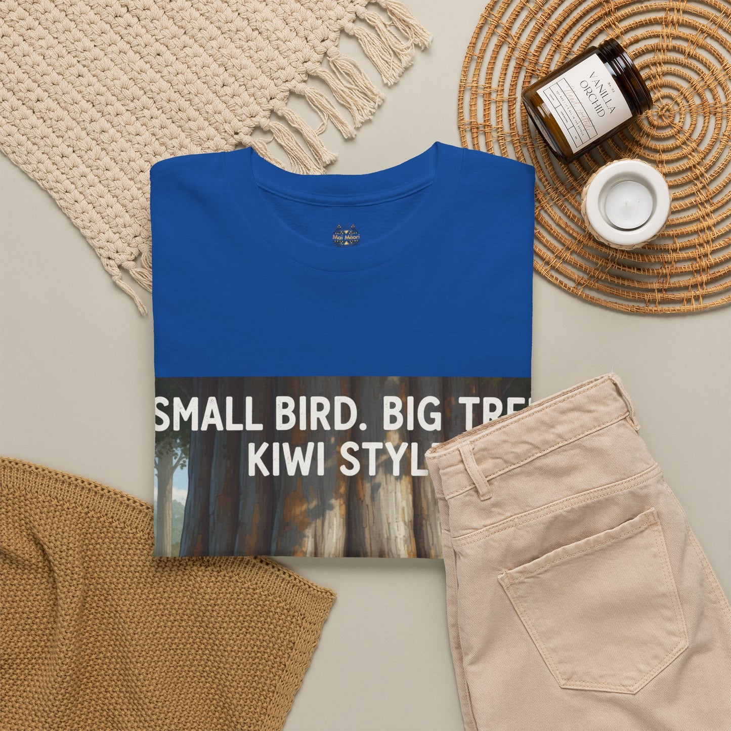 Blue crew-neck T-shirt with bold front print text and illustrated forest scene.