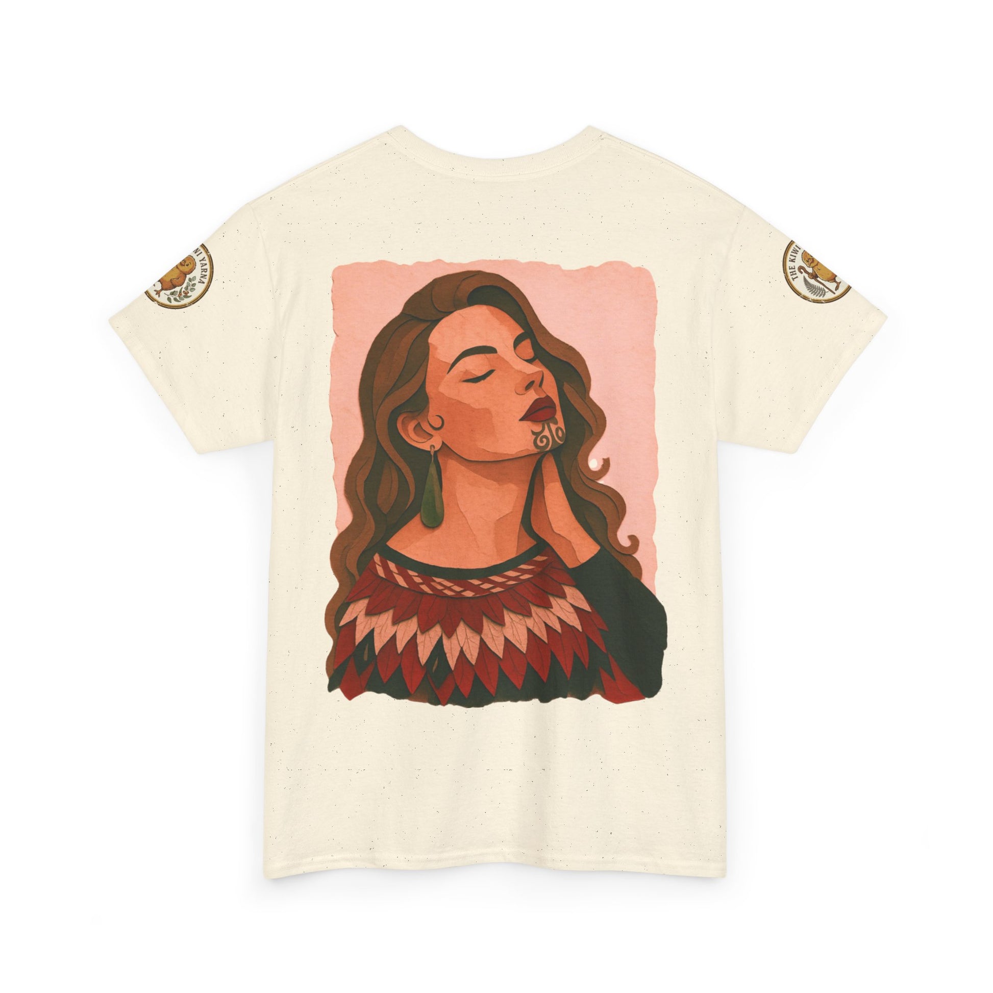Cream T-shirt with portrait graphic and gold patch detail on sleeves.