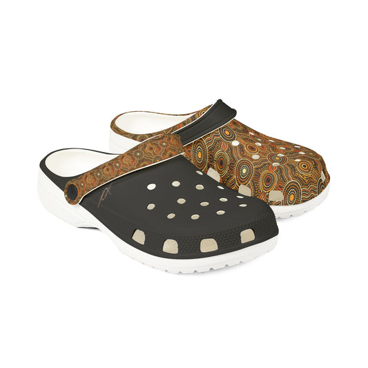 Clog sandal with patterned brown fabric upper, black perforated toe and white sole