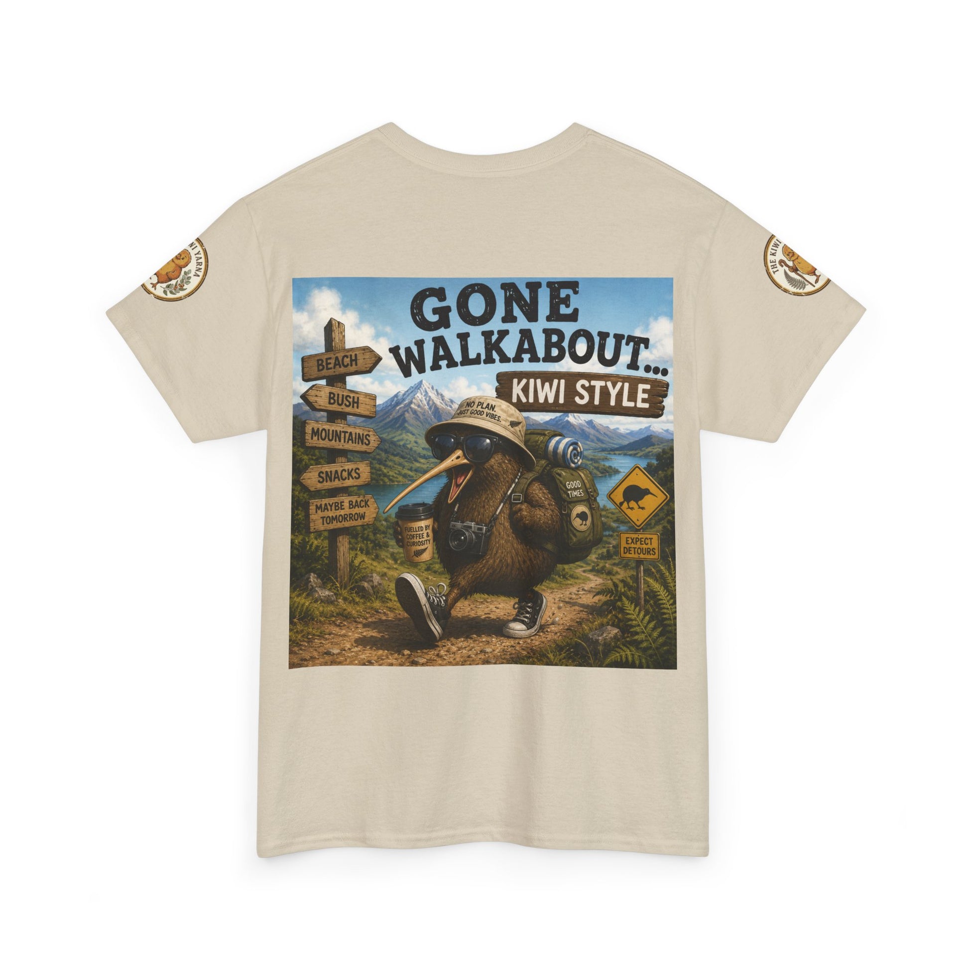 Natural T-shirt with “Gone Walkabout Kiwi Style” front graphic and logo sleeve patches.