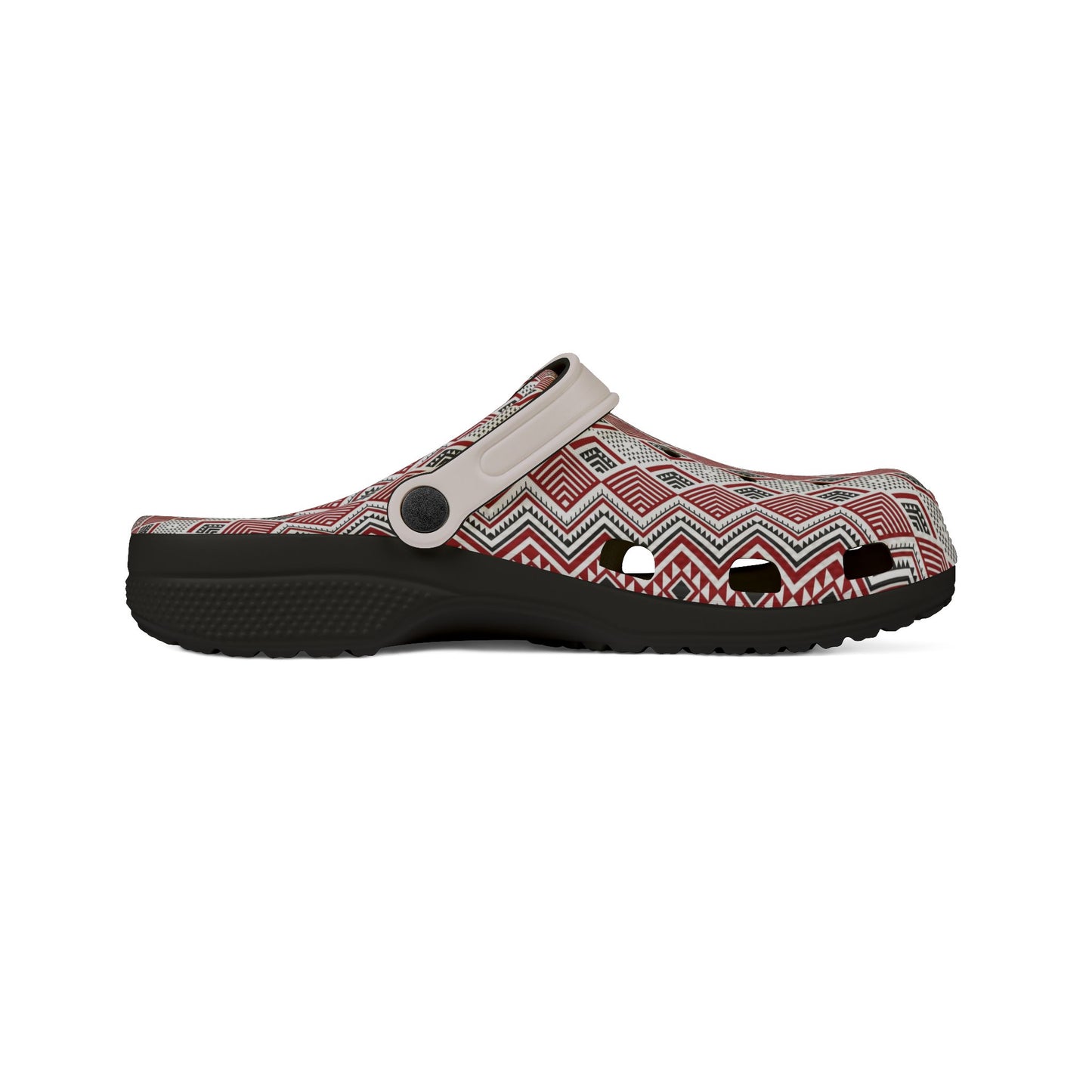 Patterned slide clogs side view with red geometric fabric, gray strap tab, and black outsole.