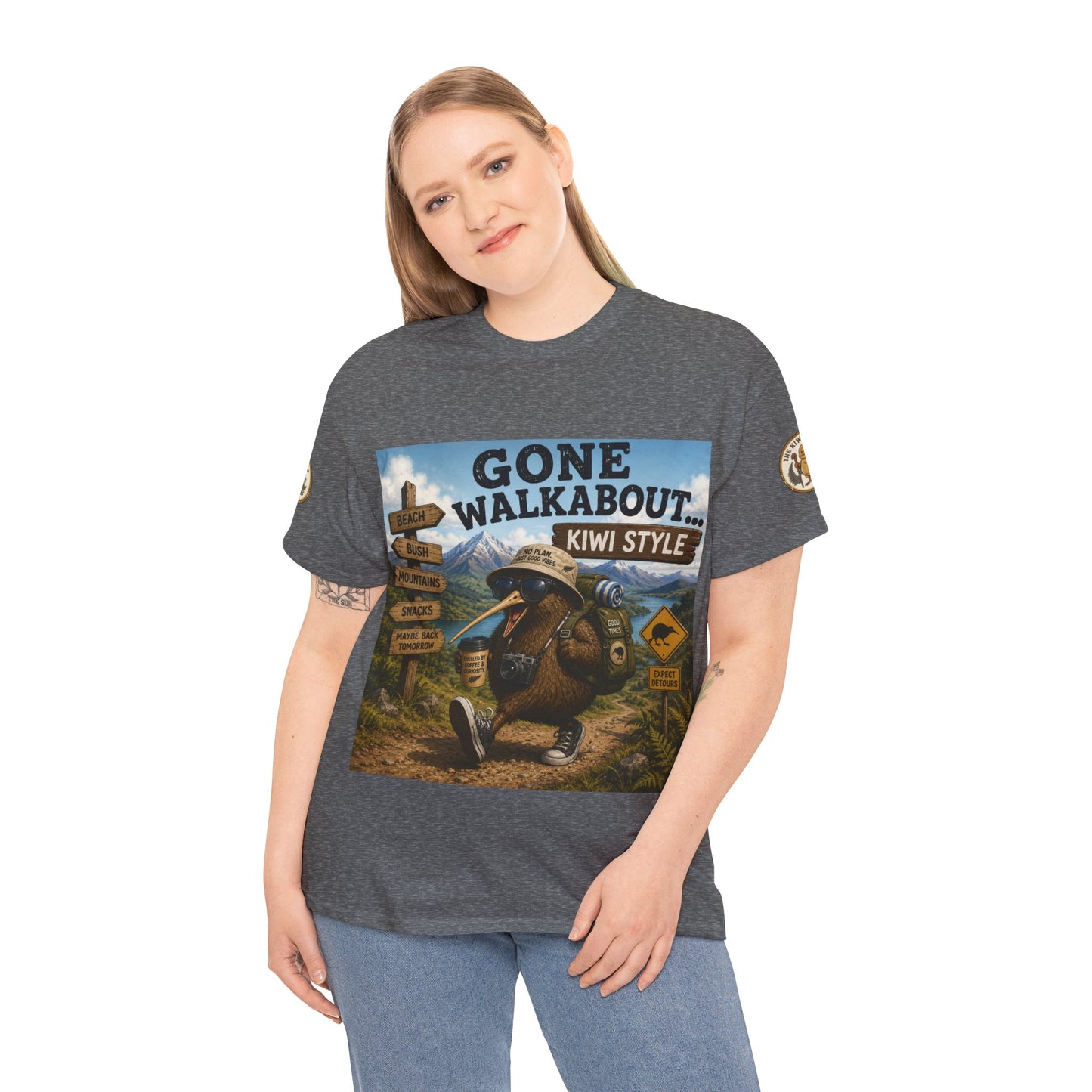 Heather gray “Gone Walkabout Kiwi Style” kiwi graphic T-shirt worn by model