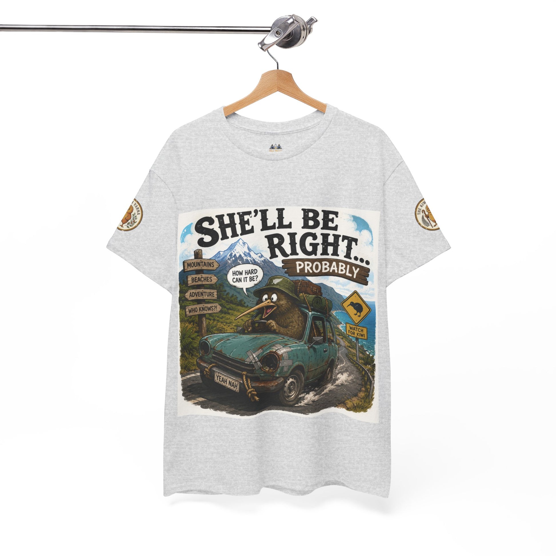 Light gray heather crewneck T-shirt with “She’ll Be Right.. Probably” front graphic and sleeve logos.