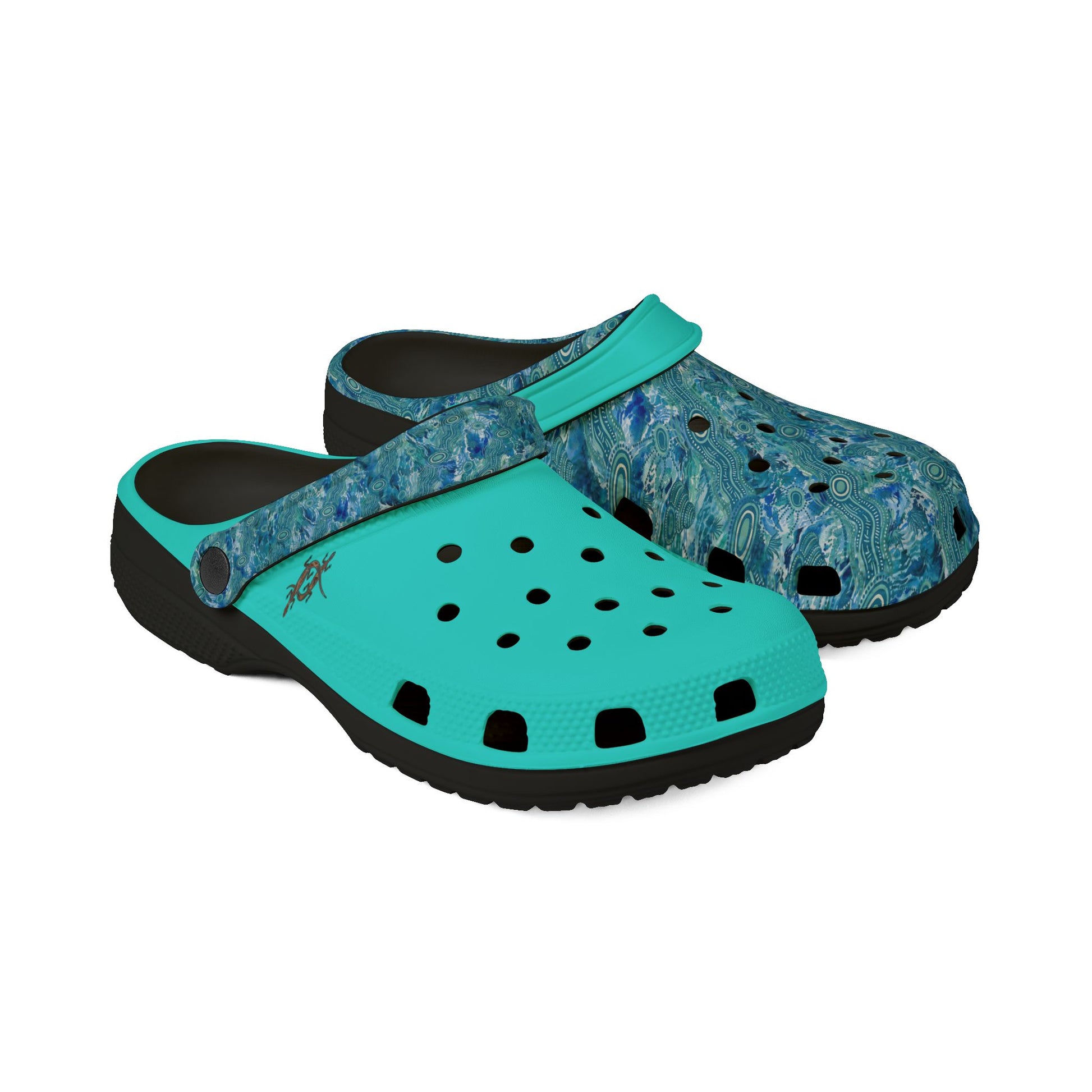Teal and blue patterned clog shoes with perforated top and black outsole detail