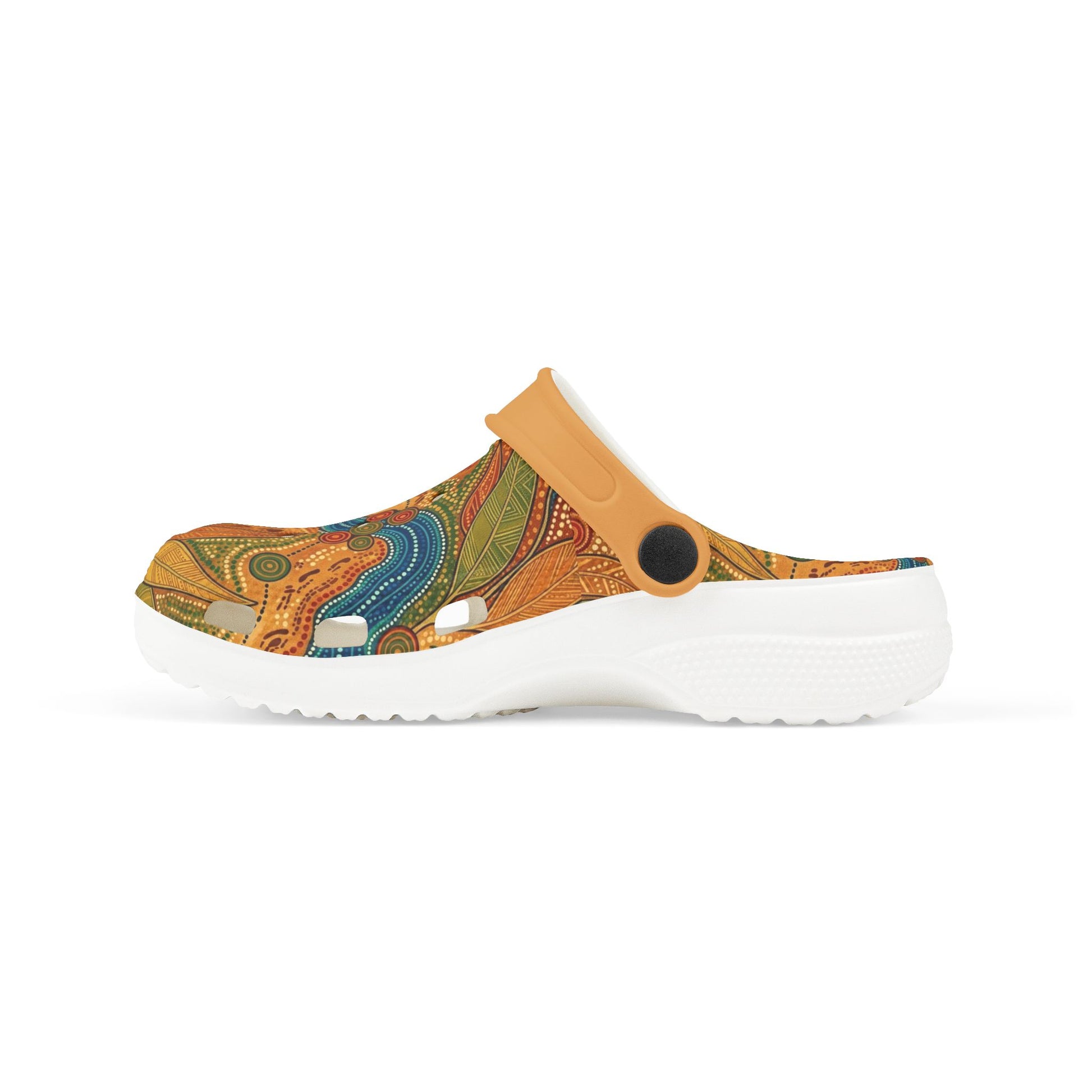 Casual slip-on clogs with tan strap and colorful Aboriginal art upper, profile view.
