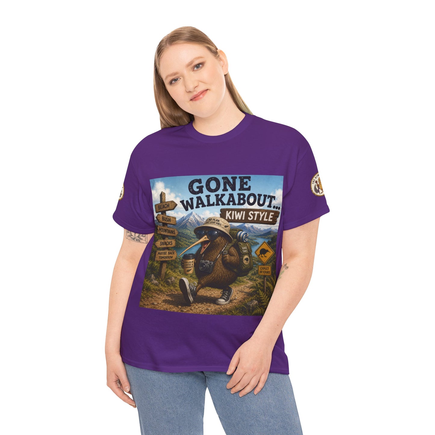 Purple crew-neck graphic T-shirt with “Gone Walkabout” kiwi-style front print and short sleeves